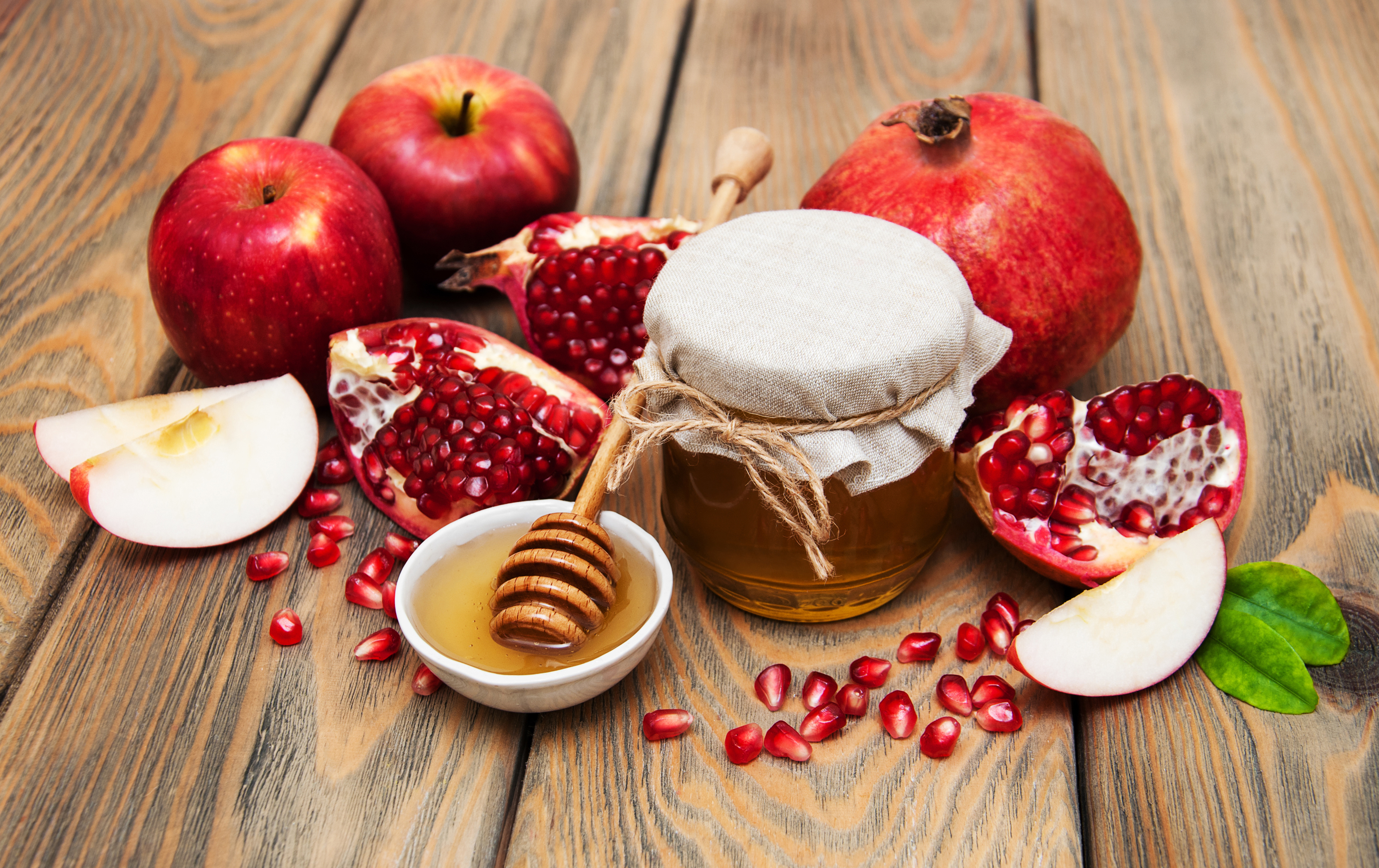 Still life with apples, pomegranates, and honey HD Wallpaper