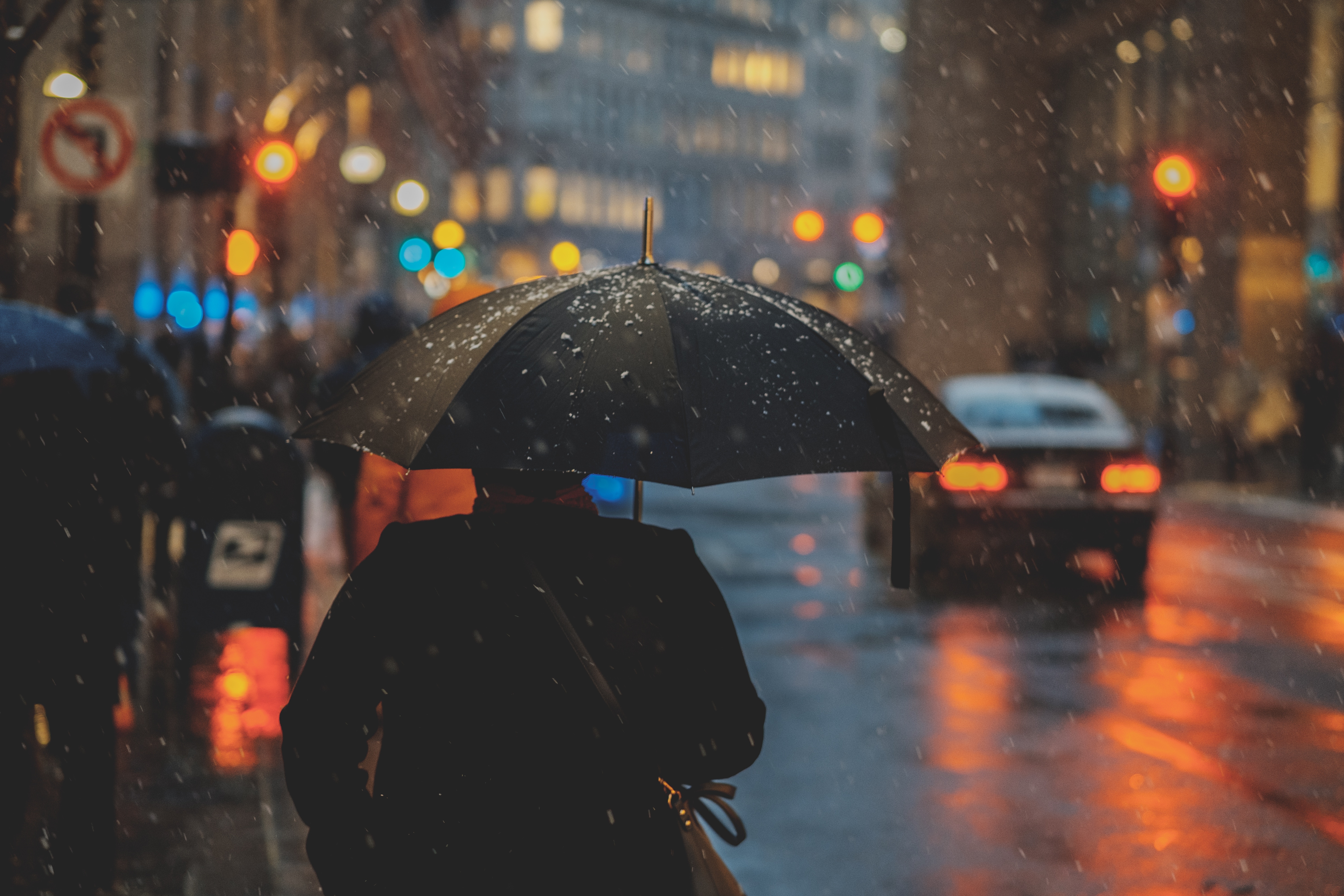 Person with umbrella in the rain at night HD Wallpaper