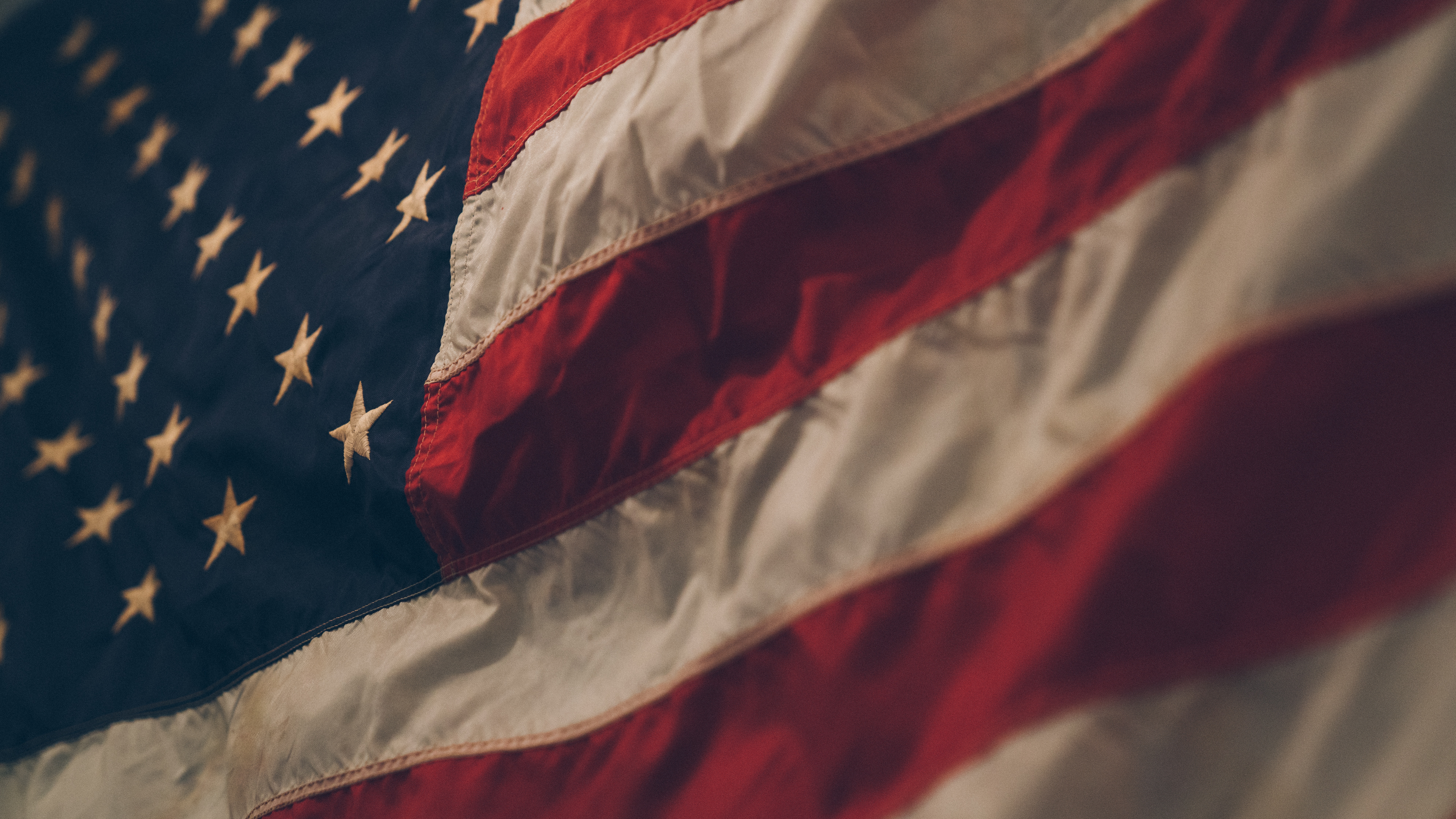 Close-up of the American flag with stars and stripes HD Wallpaper