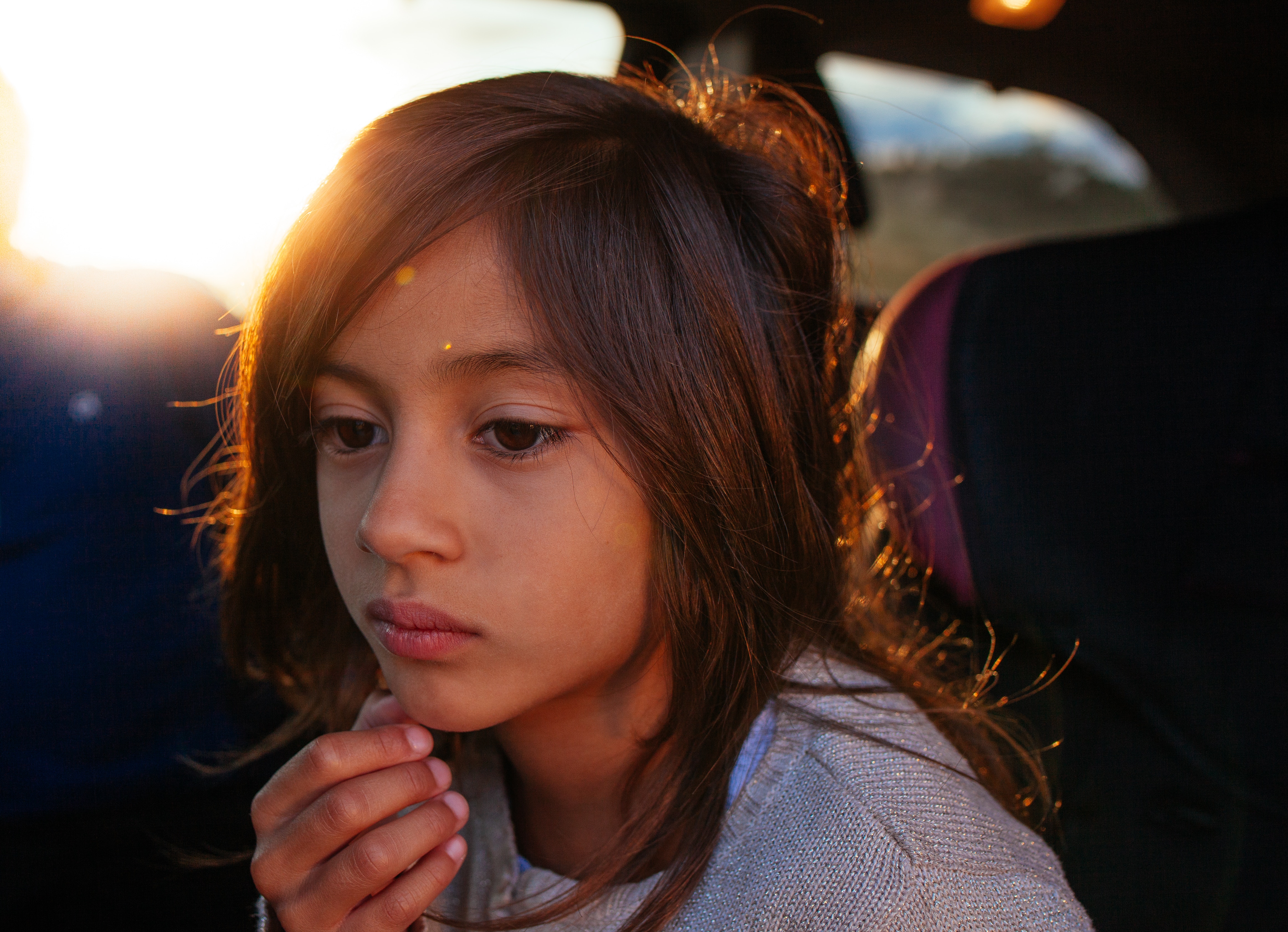 Girl in car at sunset HD Wallpaper