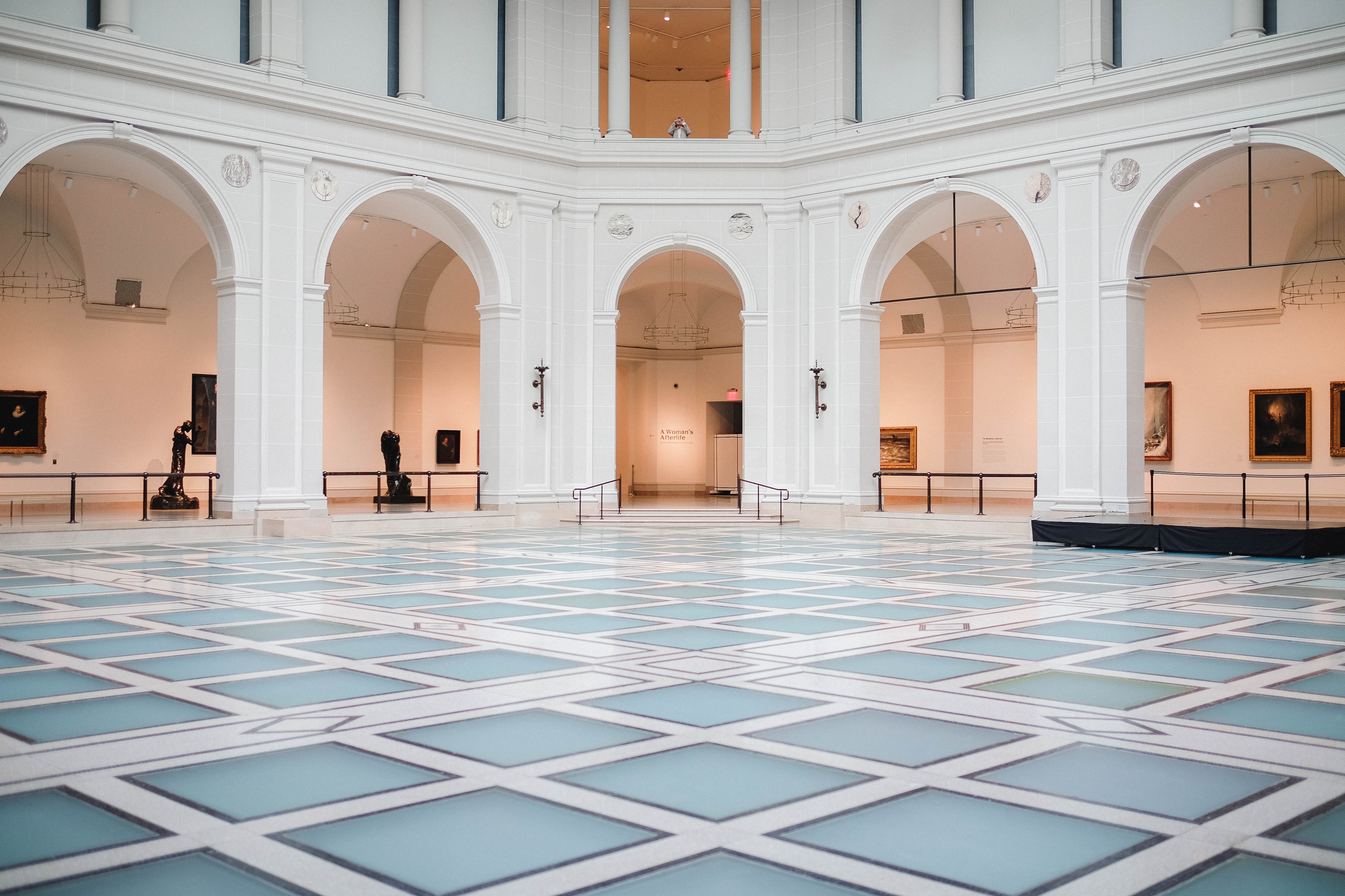 Interior of a museum with art and sculptures HD Wallpaper