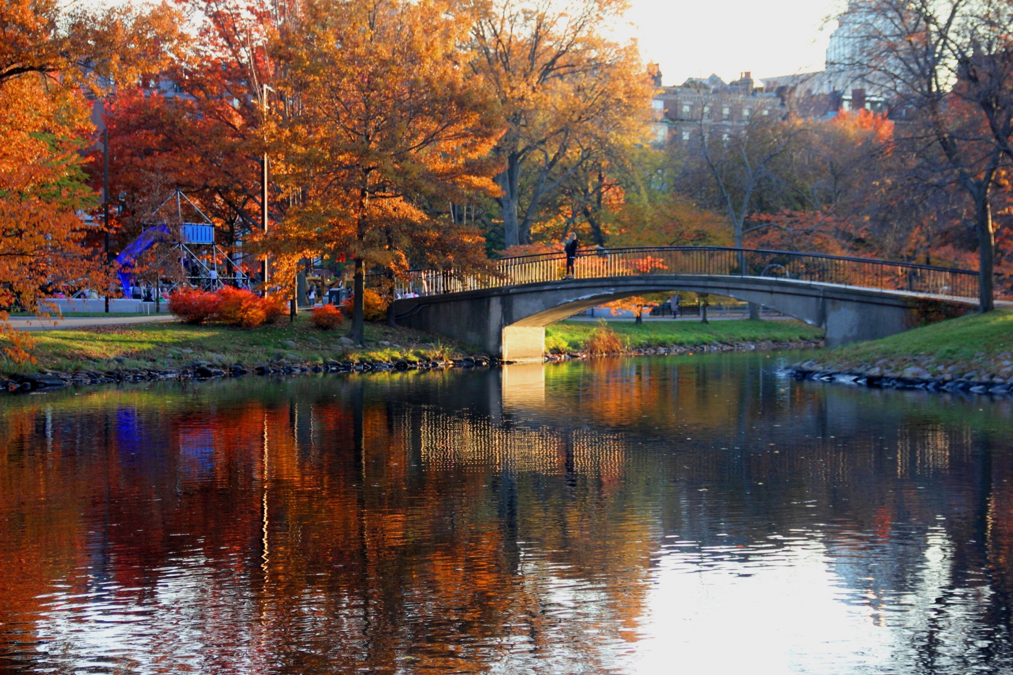 Bridge over water with autumn trees and reflections HD Wallpaper