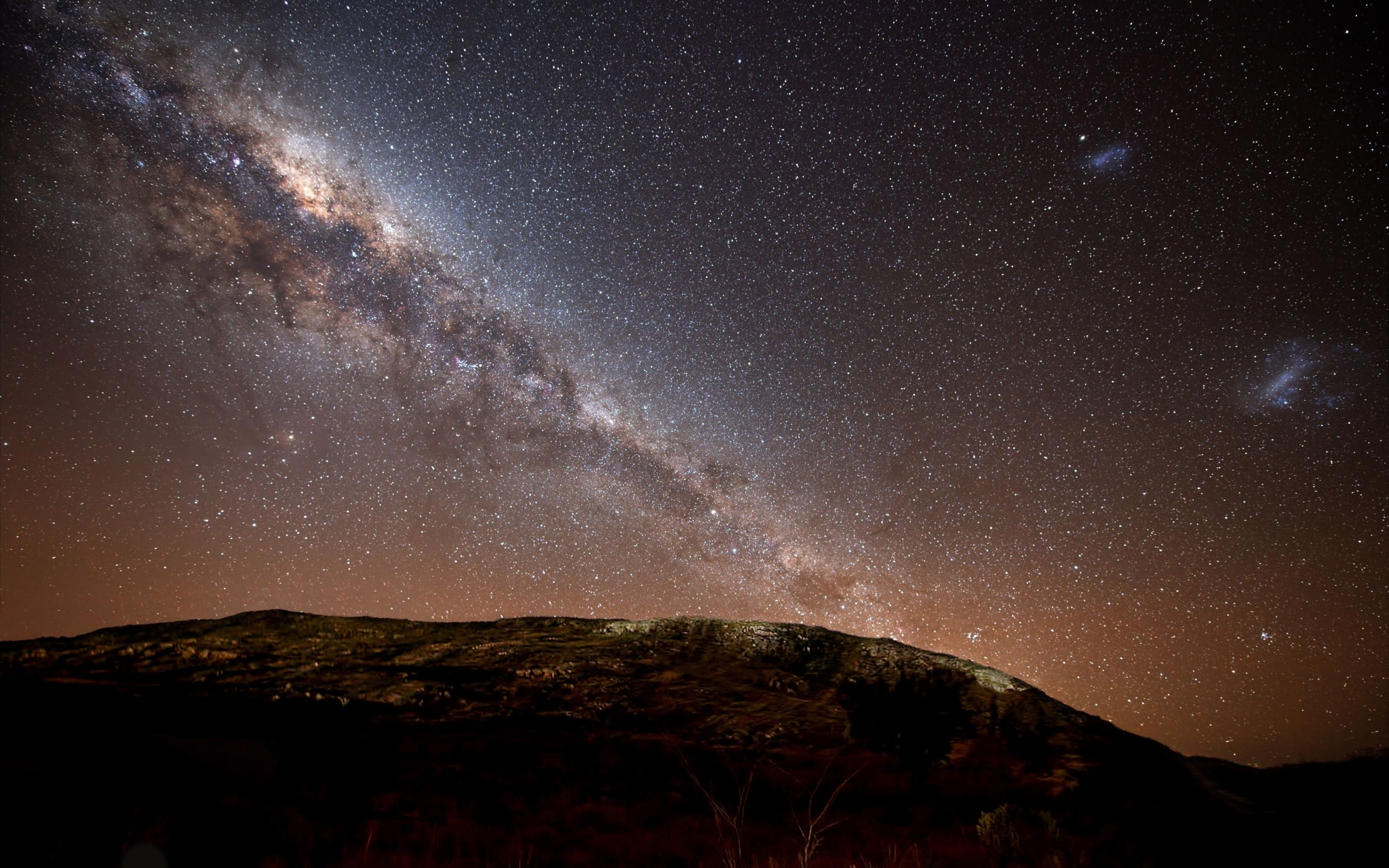 Milky Way Galaxy over a Mountainous Landscape HD Wallpaper