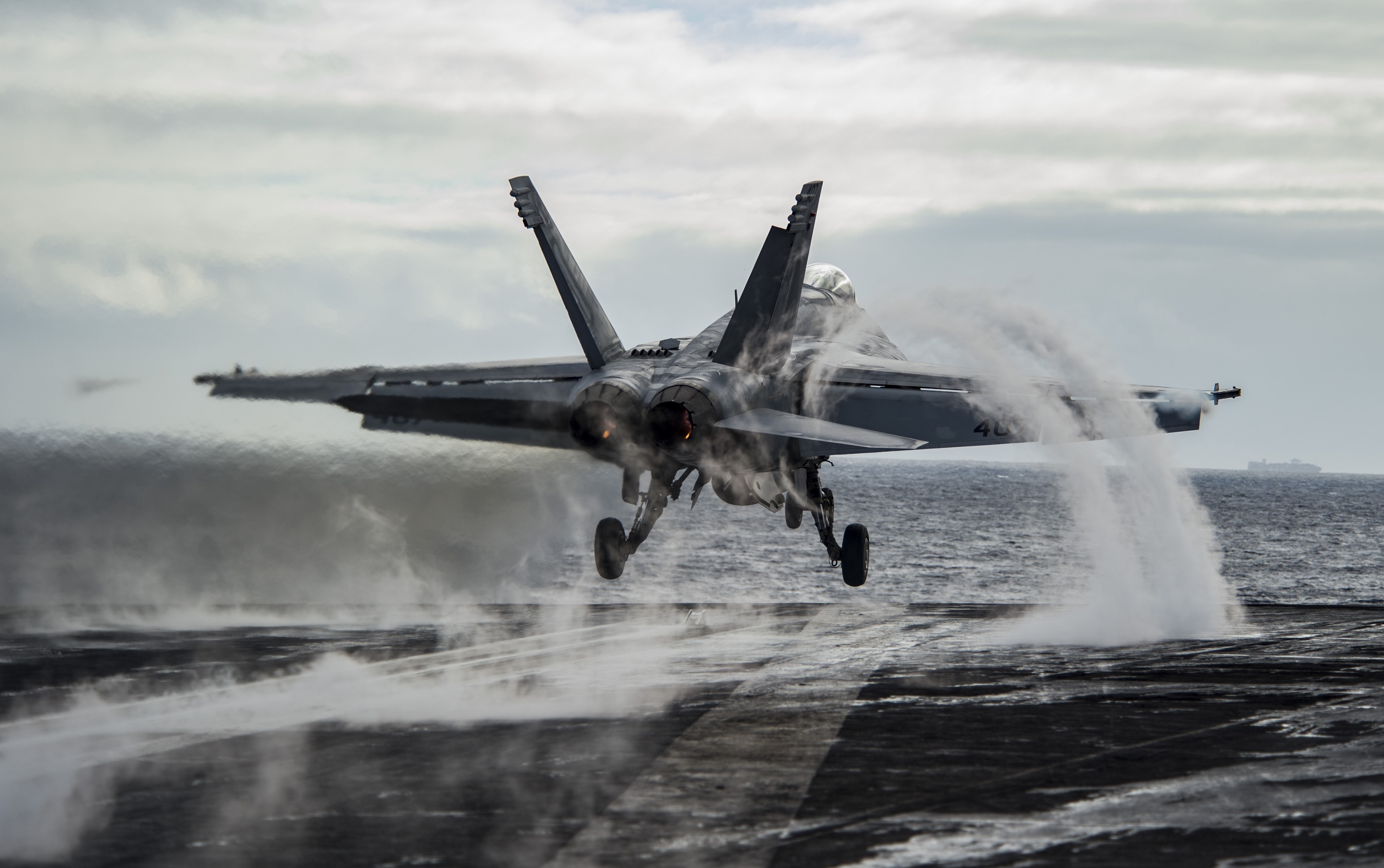 McDonnell Douglas FA-18 Hornet landing on aircraft carrier HD Wallpaper
