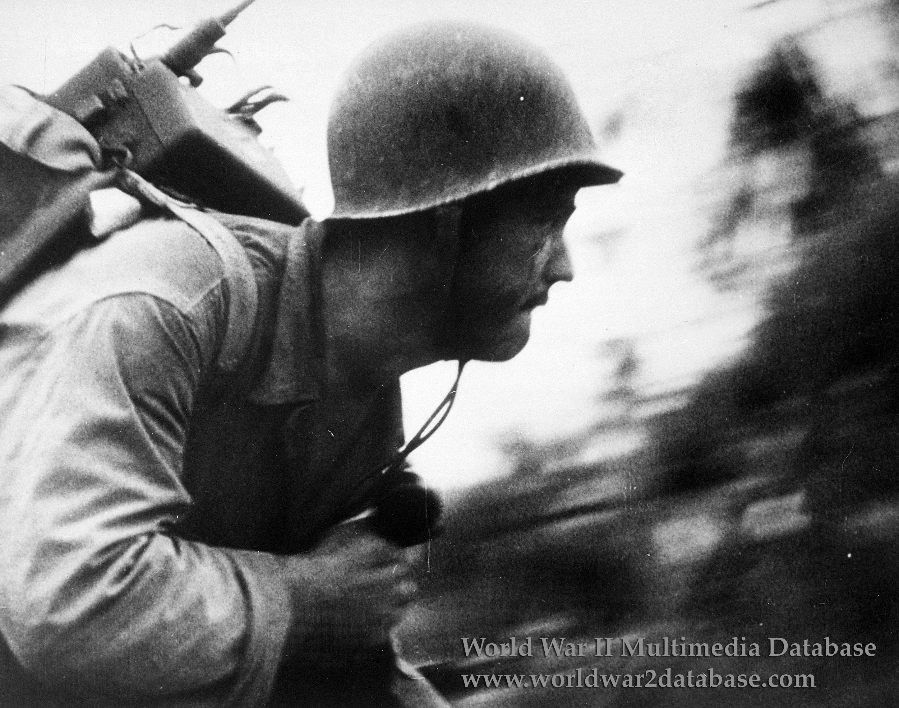 Soldier with radio equipment in motion HD Wallpaper
