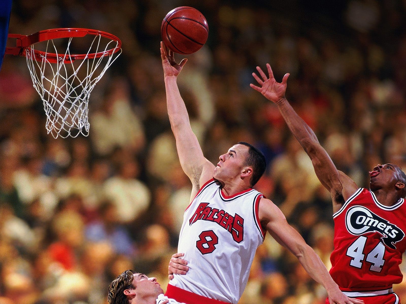 Basketball players during a game HD Wallpaper