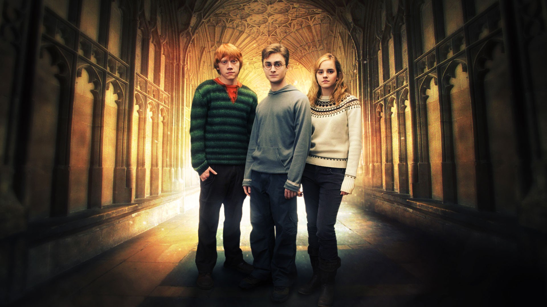 Harry Potter, Ron Weasley, and Hermione Granger in a hallway HD Wallpaper