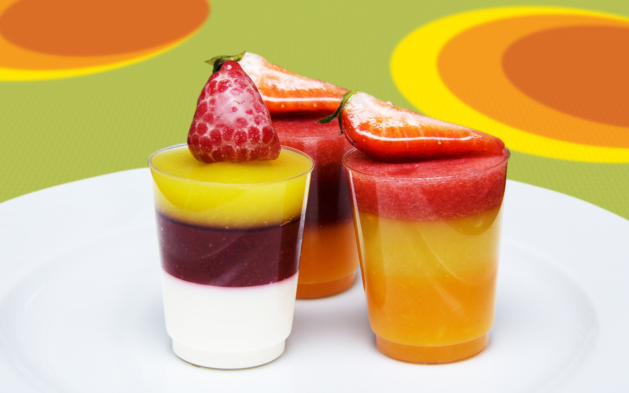 Layered fruit desserts with berries on a white plate HD Wallpaper