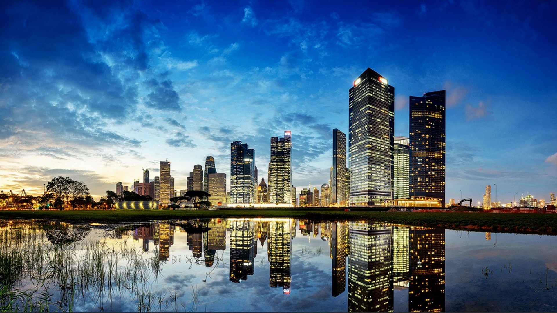 Singapore Skyline Reflected in Water at Dusk HD Wallpaper