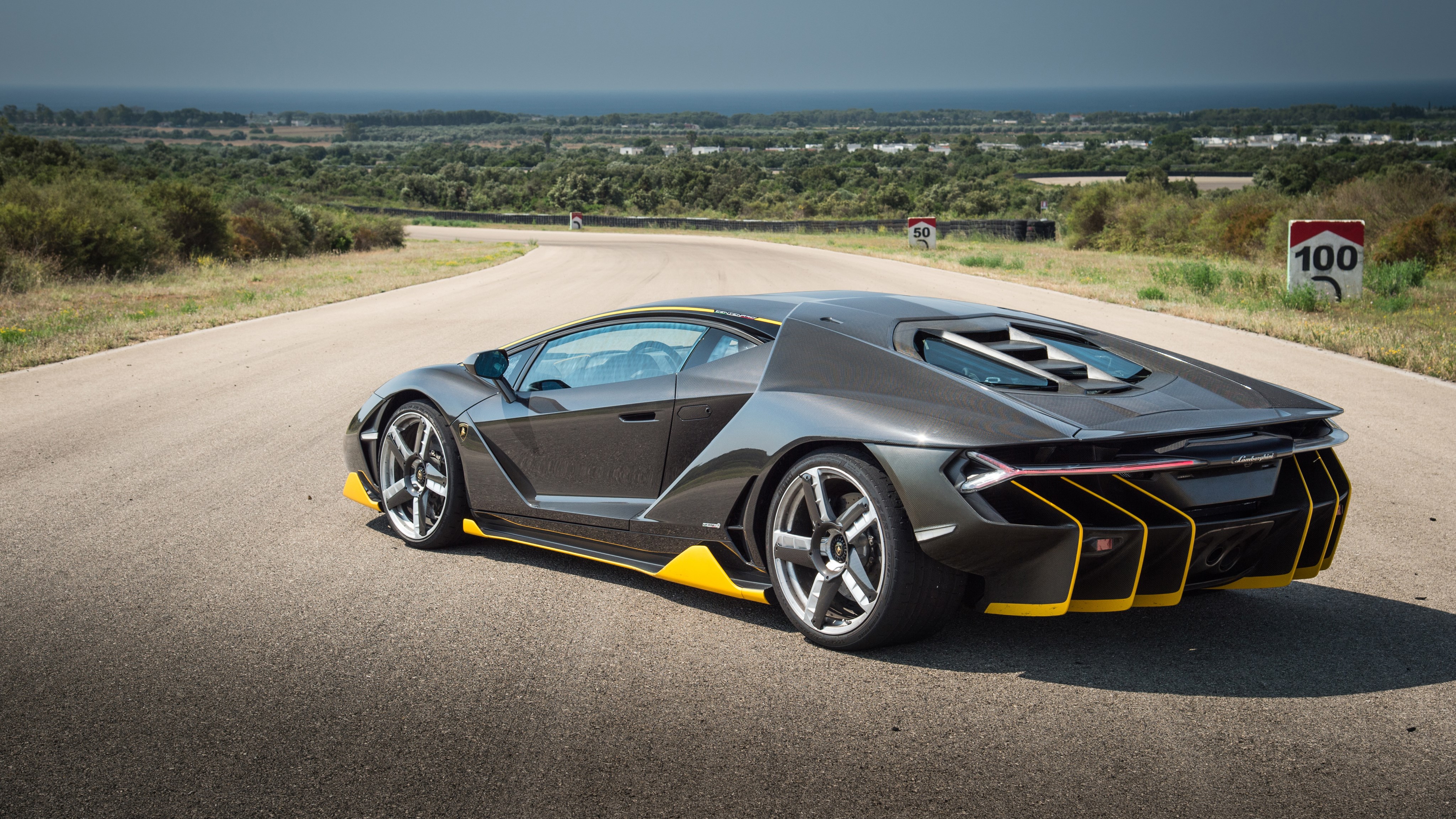 Lamborghini Centenario on a road HD Wallpaper