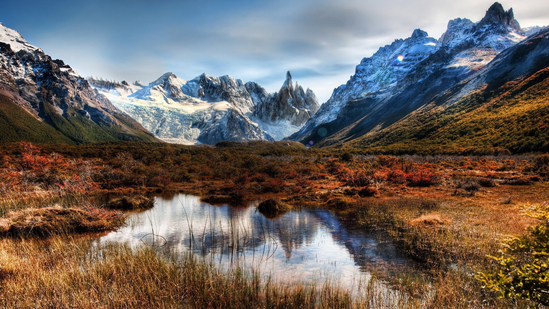Mountain range with glacier and autumn foliage HD Wallpaper