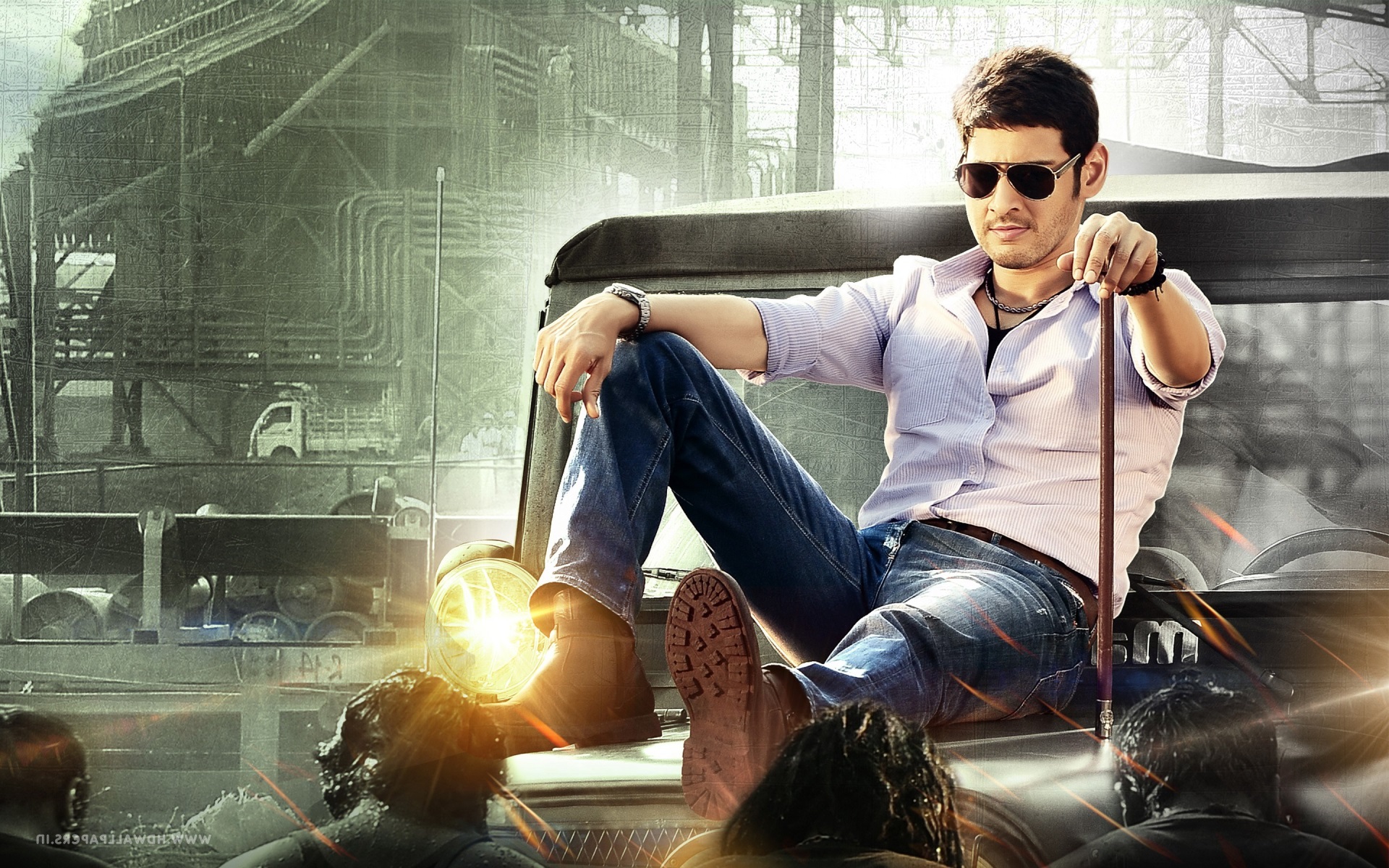 Mahesh Babu sitting on a vehicle HD Wallpaper