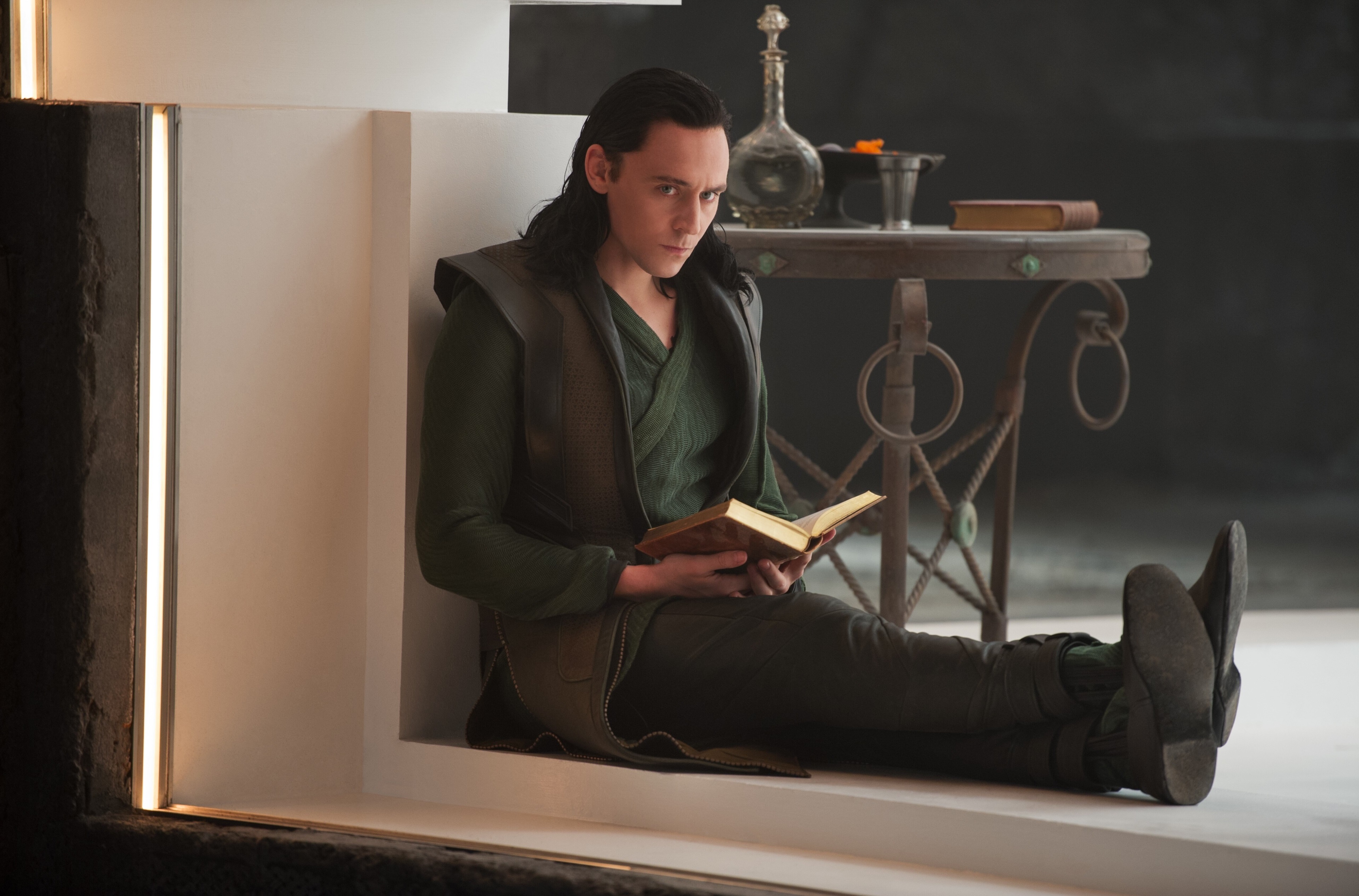 Loki from Thor reading a book HD Wallpaper