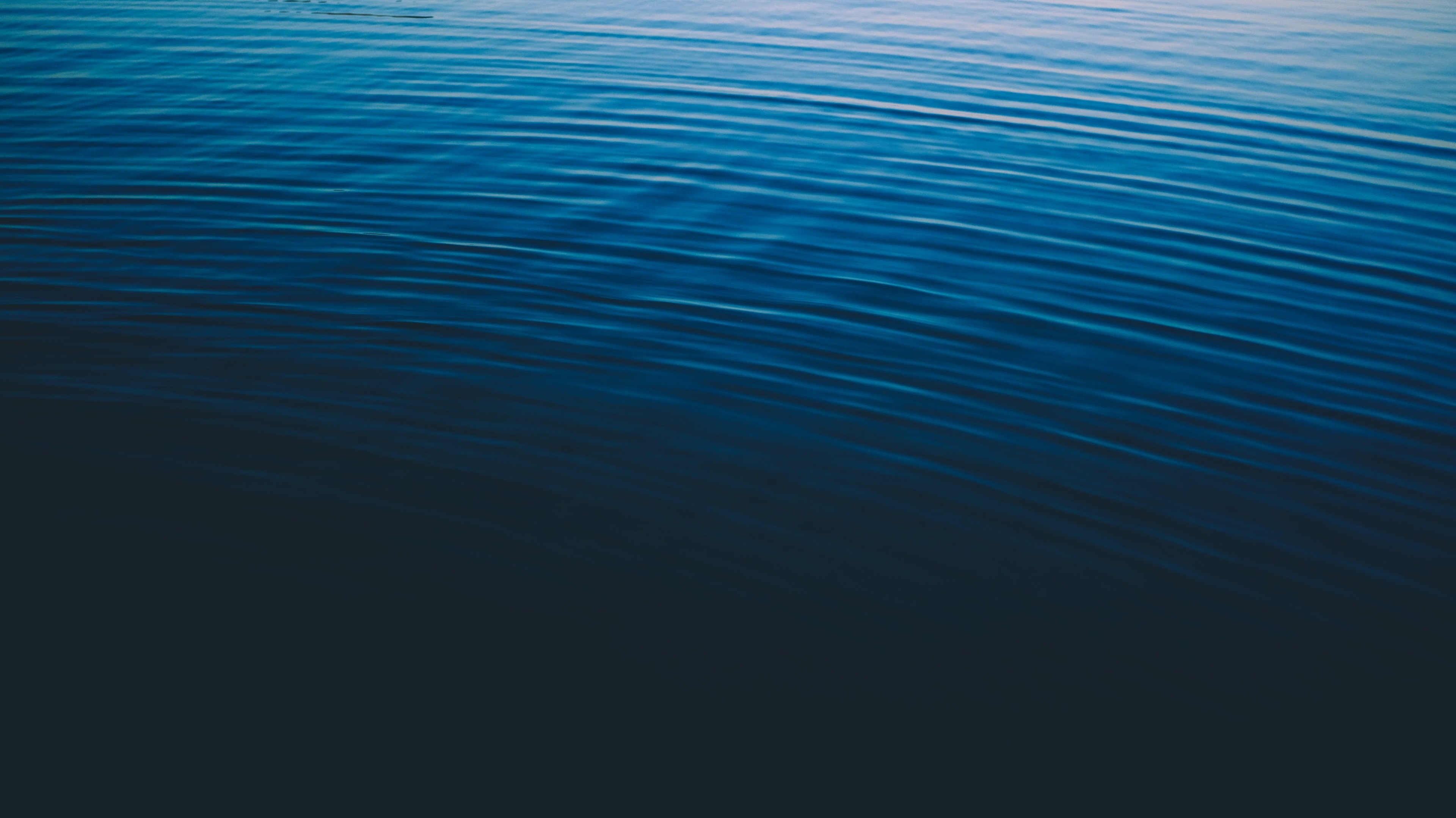Blue water surface with ripples 4K HD Wallpaper