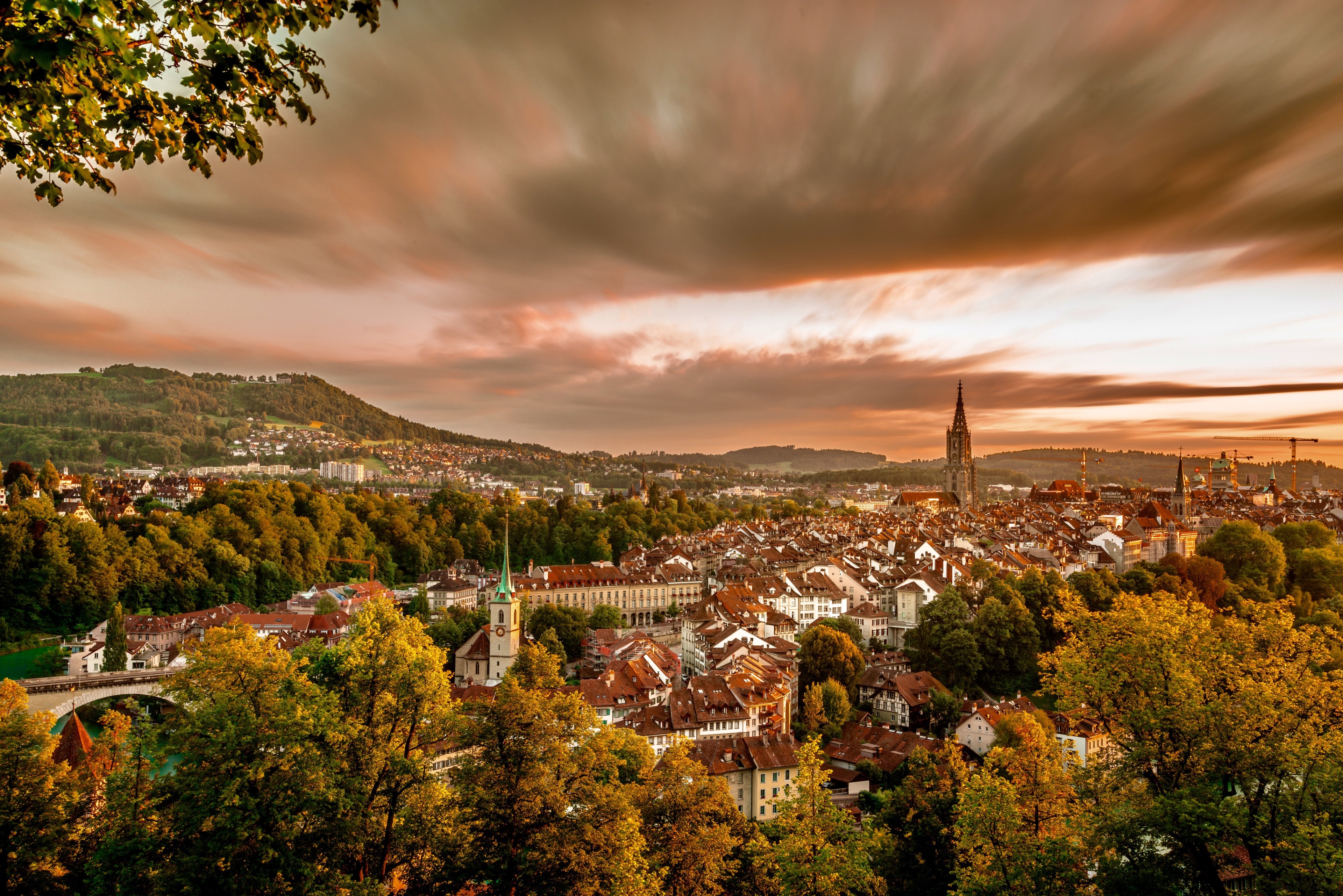 Bern cityscape with a church tower at sunset, 4K HD Wallpaper