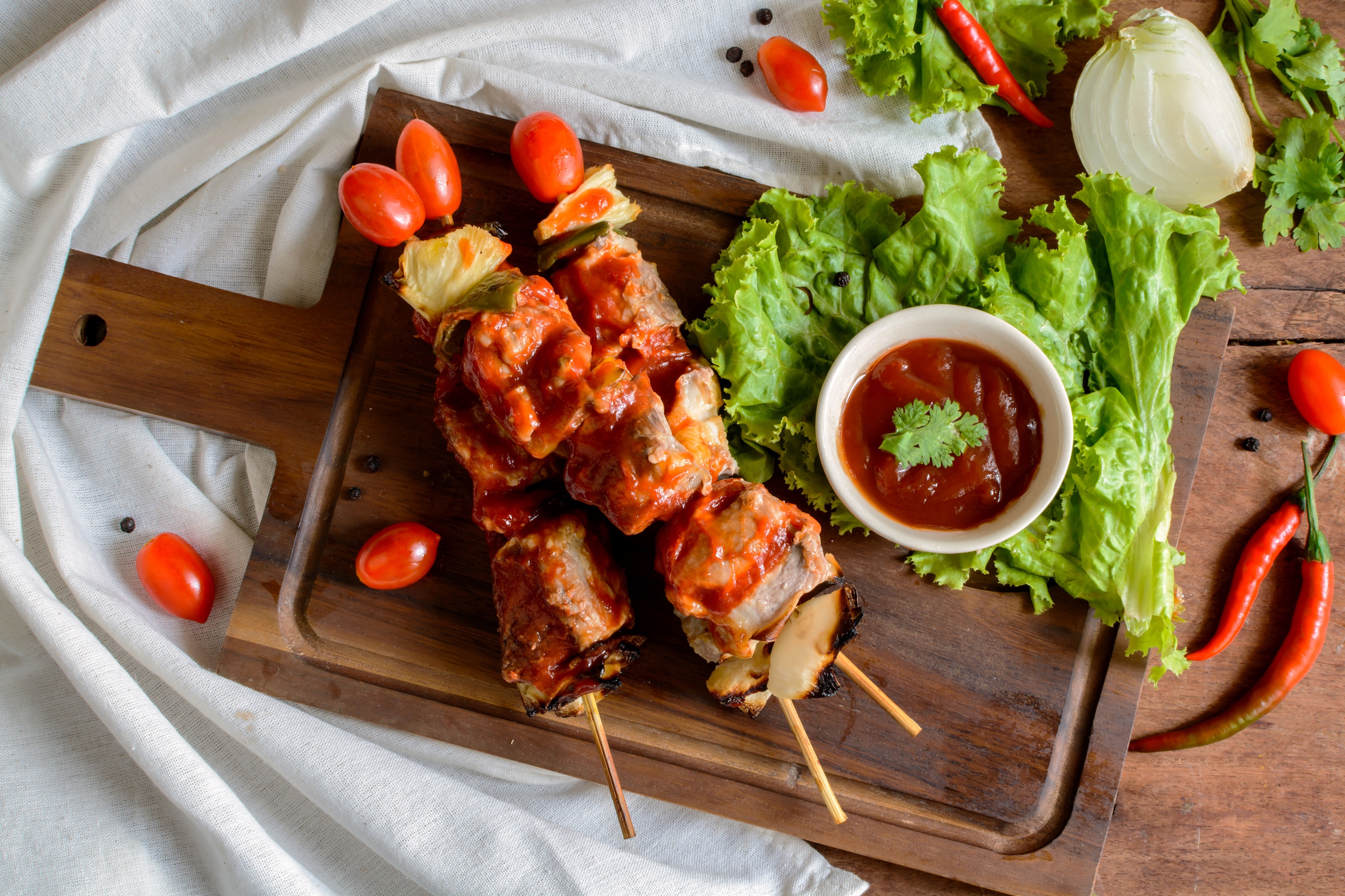 Barbecue skewers with sauce and vegetables 4K HD Wallpaper