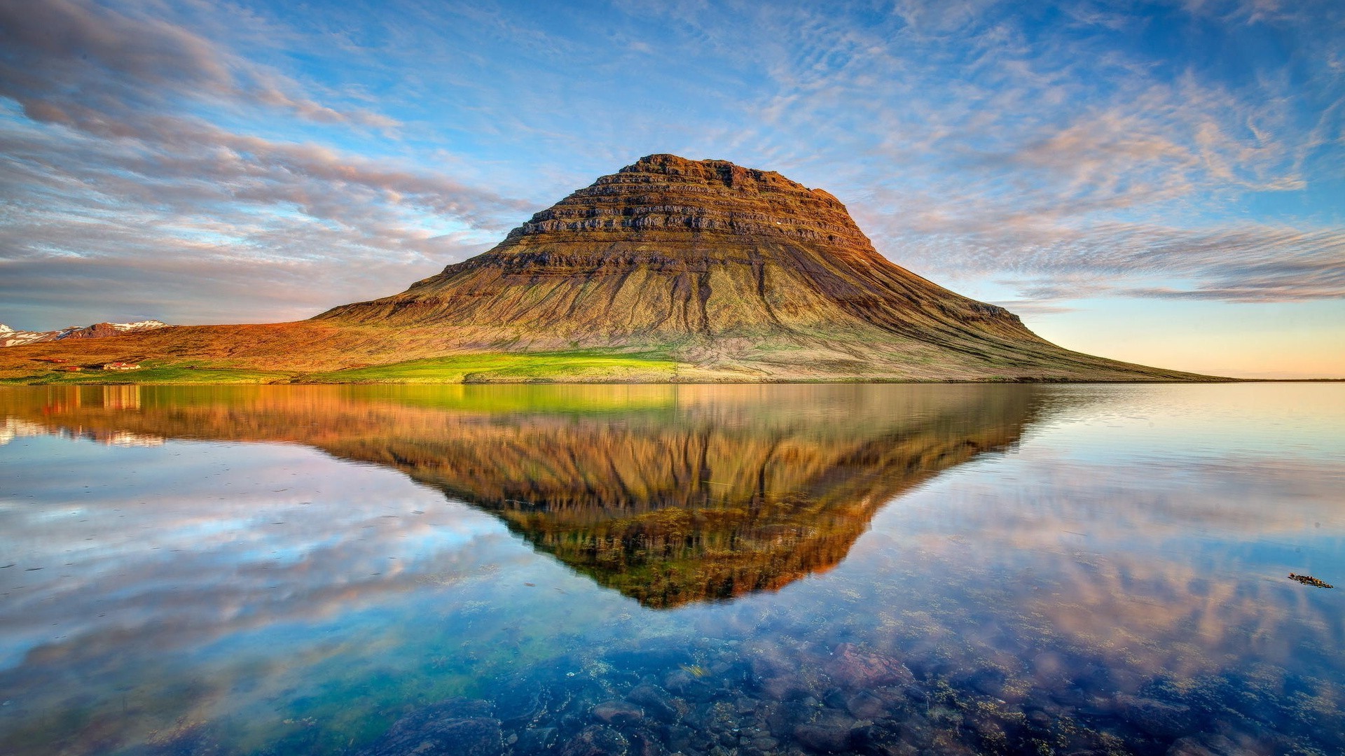 Kirkjufell mountain reflected in a lake in Iceland HD Wallpaper