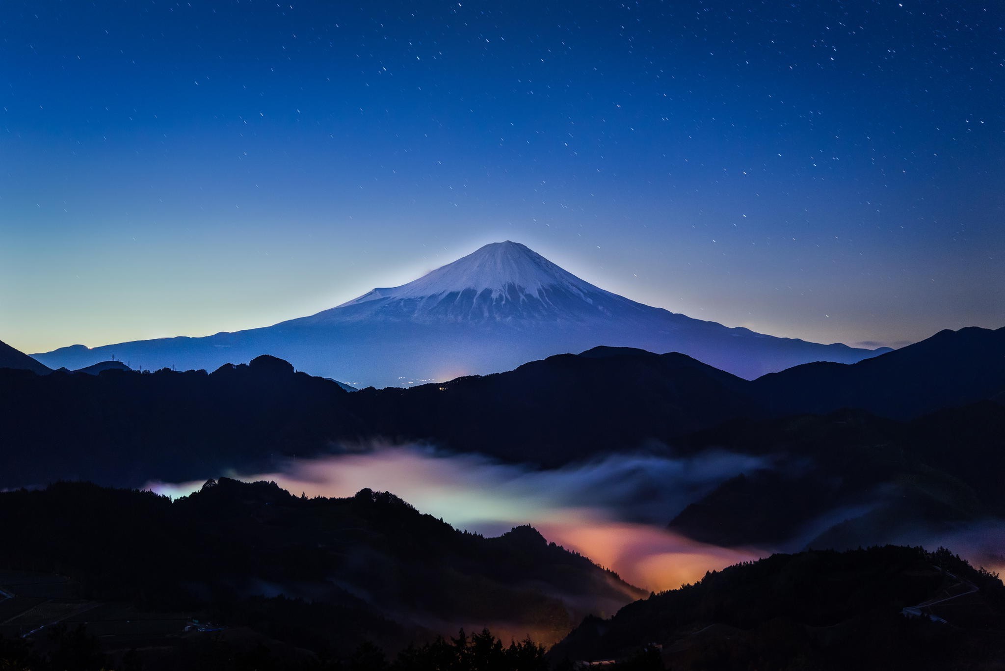 Mount Fuji at night with stars and fog HD Wallpaper