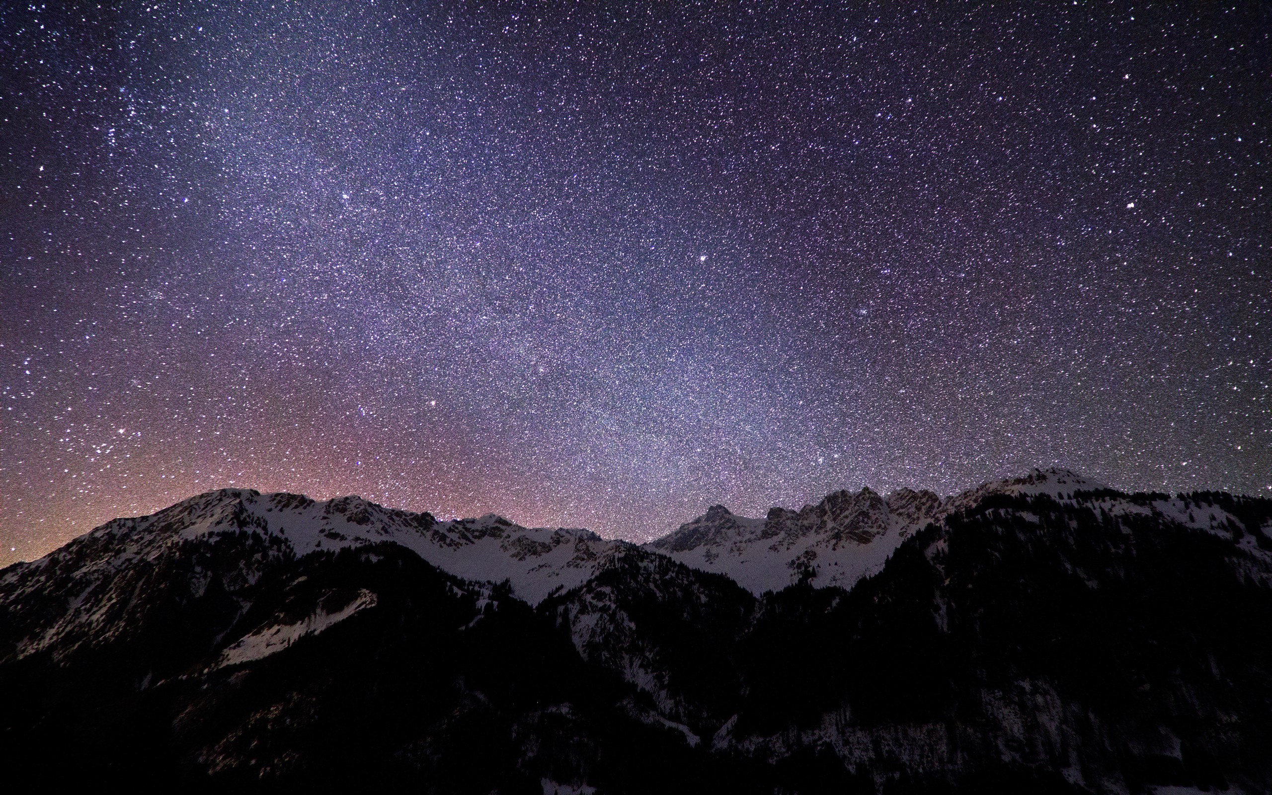 Starry night sky over snow-capped mountains HD Wallpaper