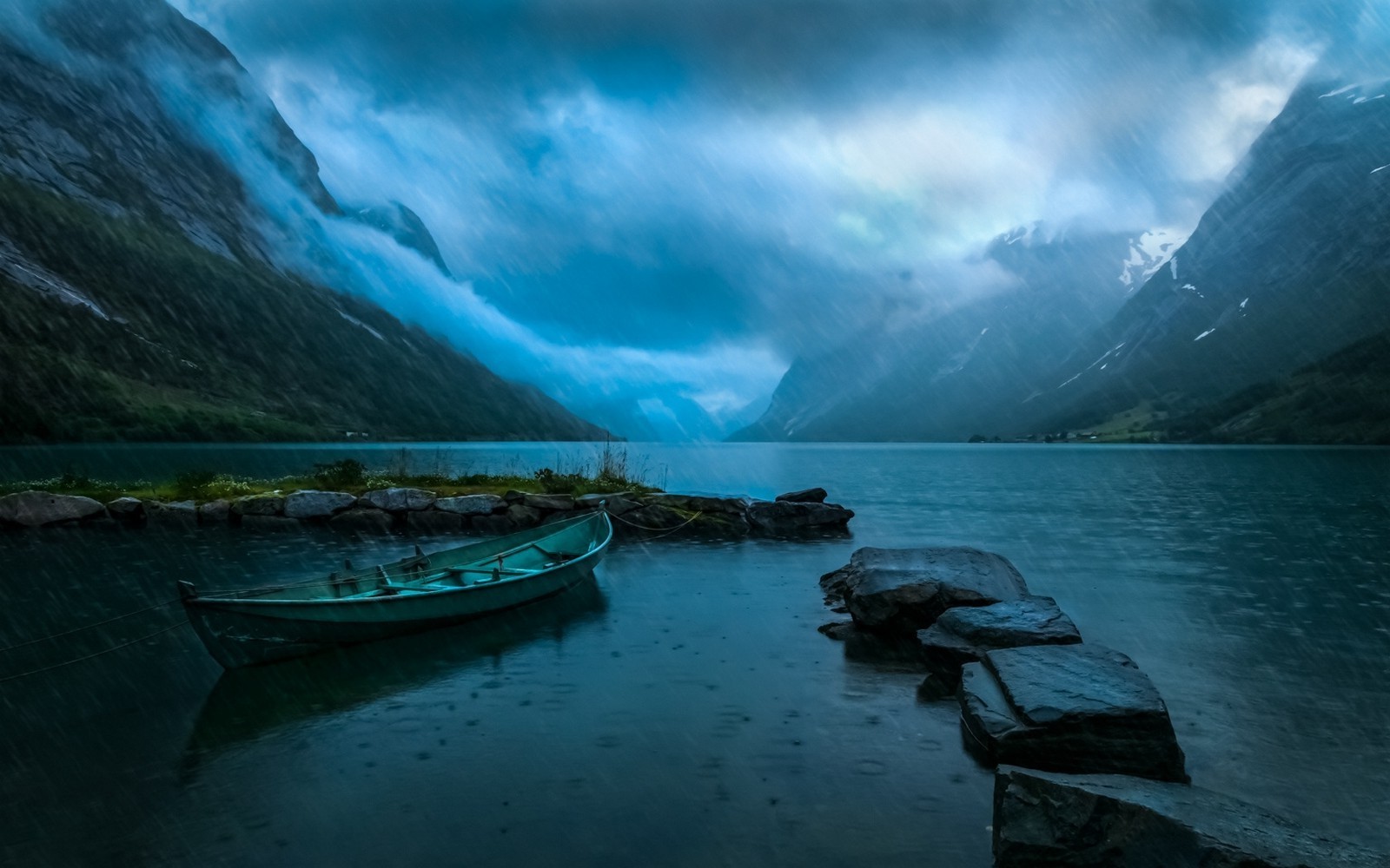Boat on a lake in Norway during rain HD Wallpaper