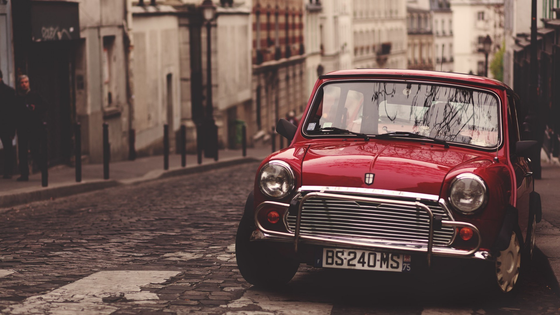 Classic Red Mini Cooper Parked on Cobbled Street HD Wallpaper
