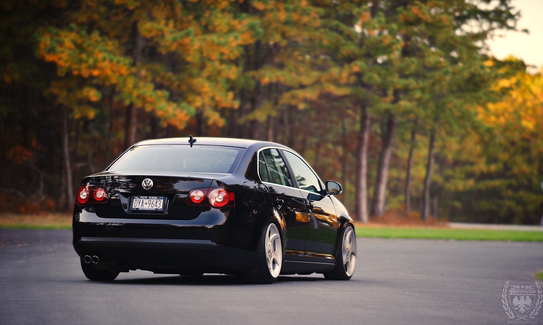 Black Volkswagen Jetta on a Road HD Wallpaper