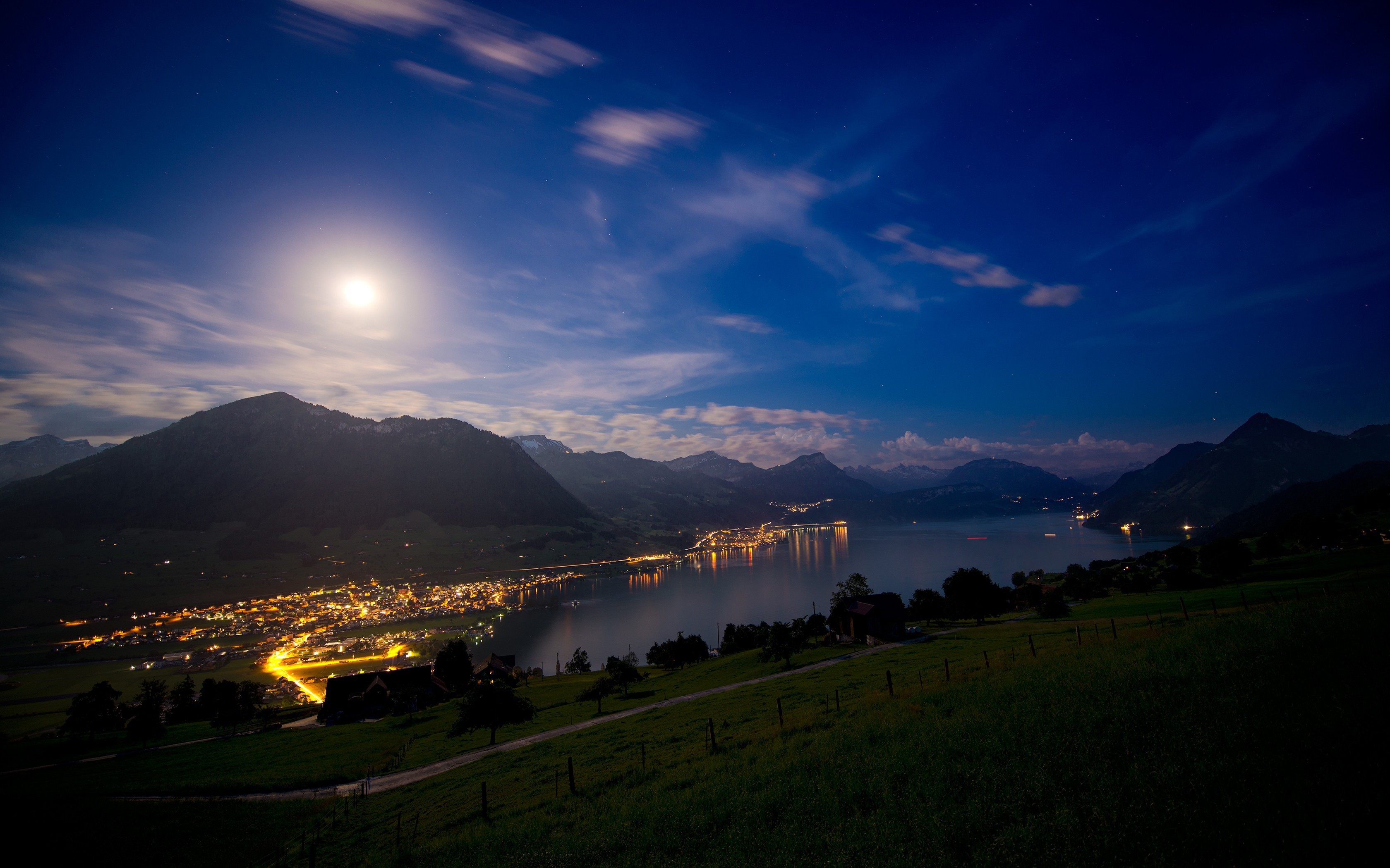 Moonlit Swiss Town on a Lake with Mountains HD Wallpaper