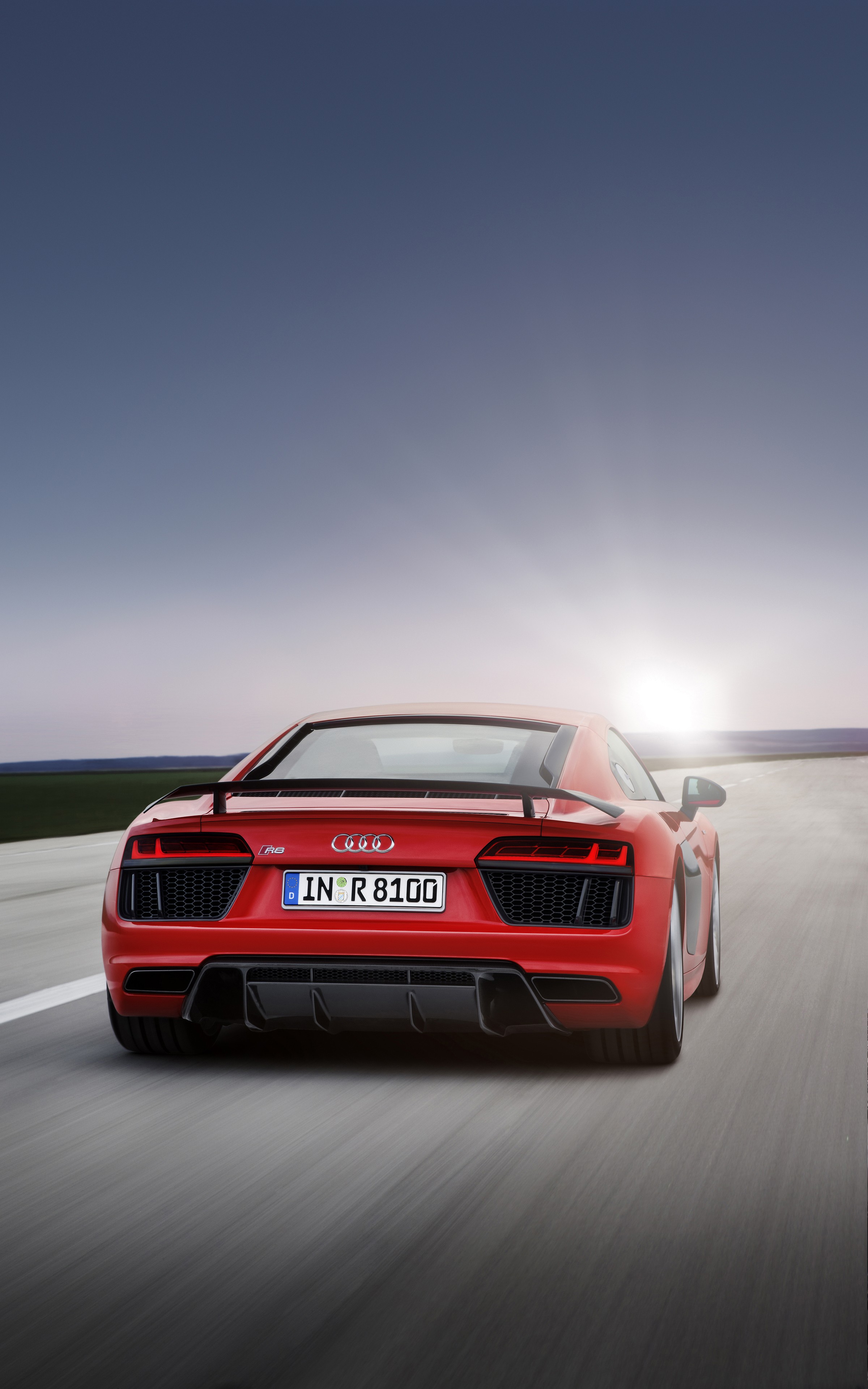 Red Audi R8 driving on a road HD Wallpaper
