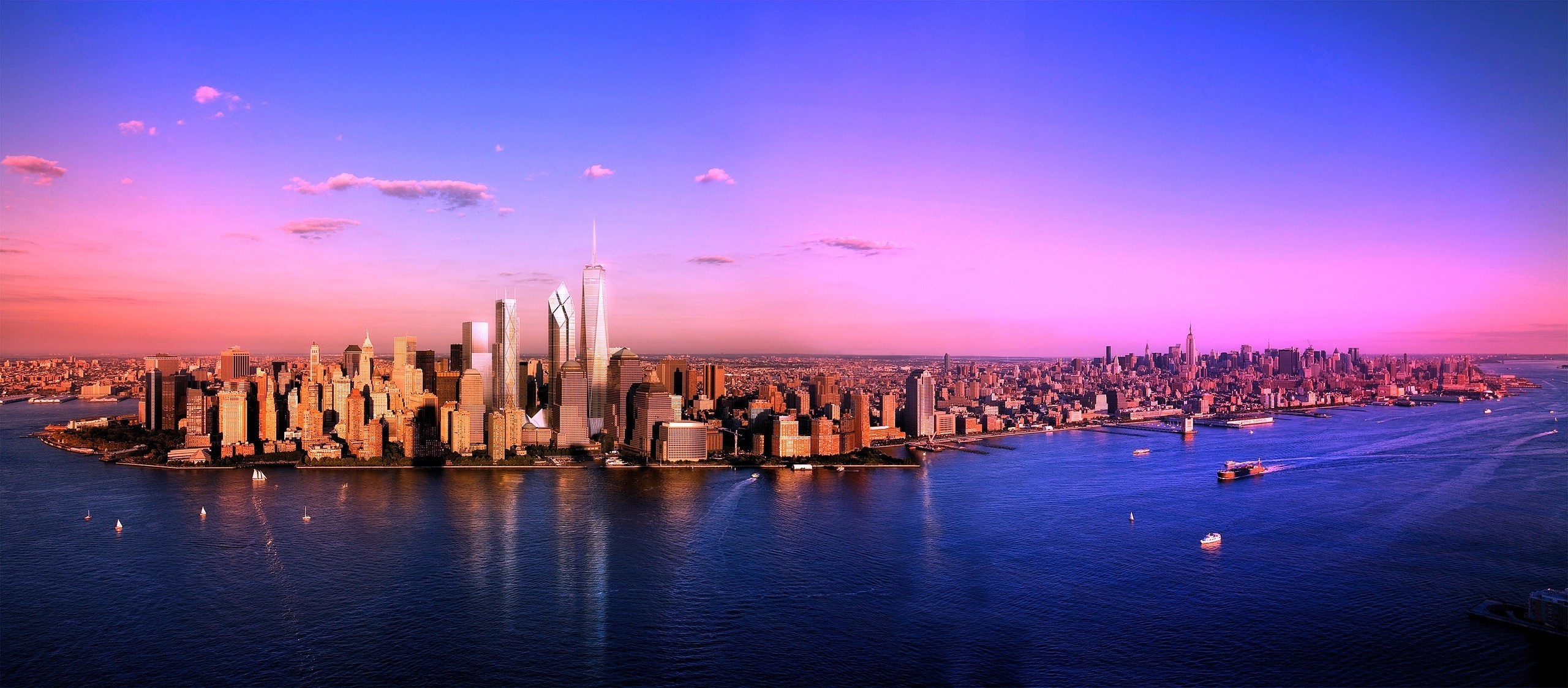 New York City skyline at sunset over the river HD Wallpaper