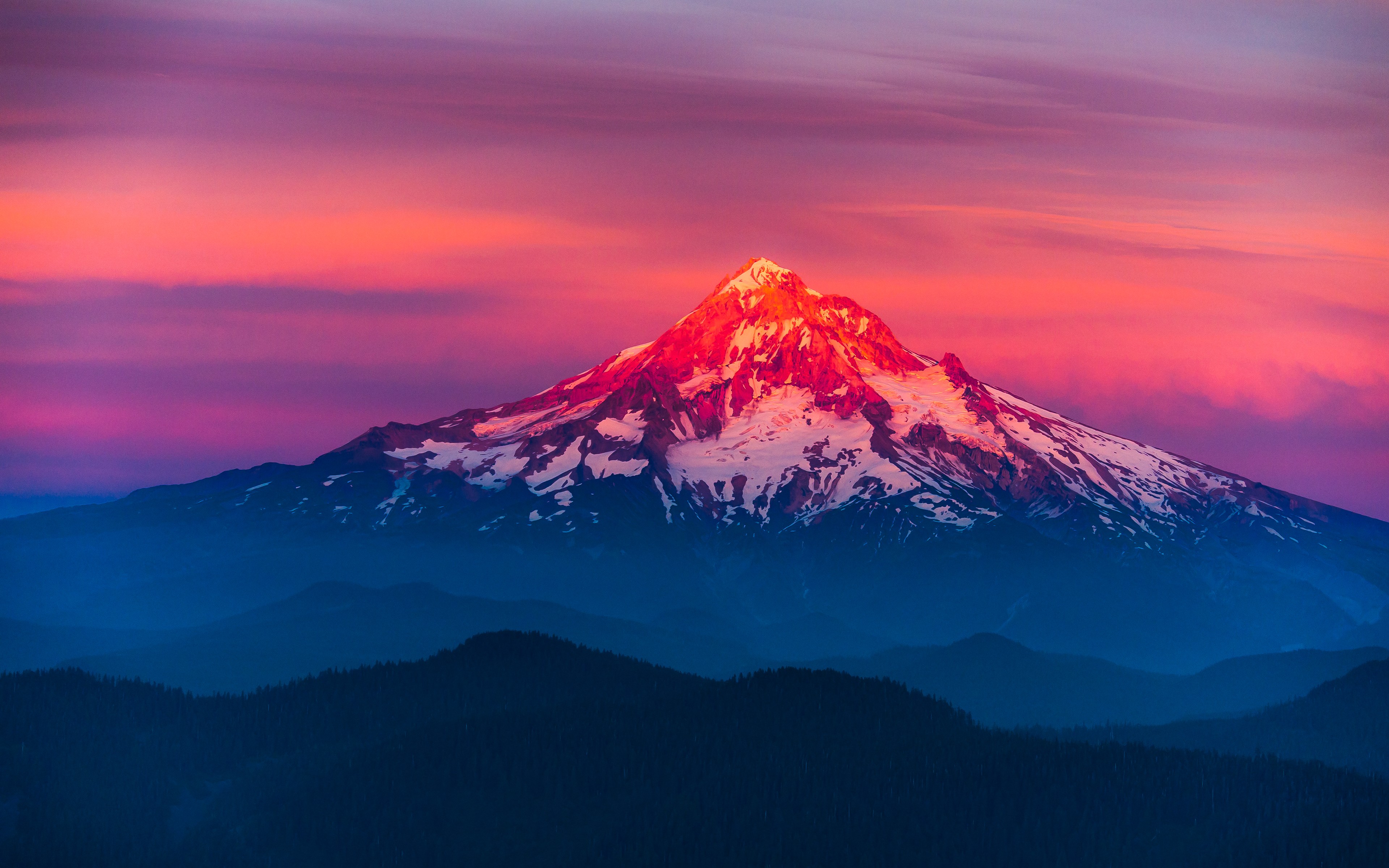 Mountain peak illuminated by sunset HD Wallpaper