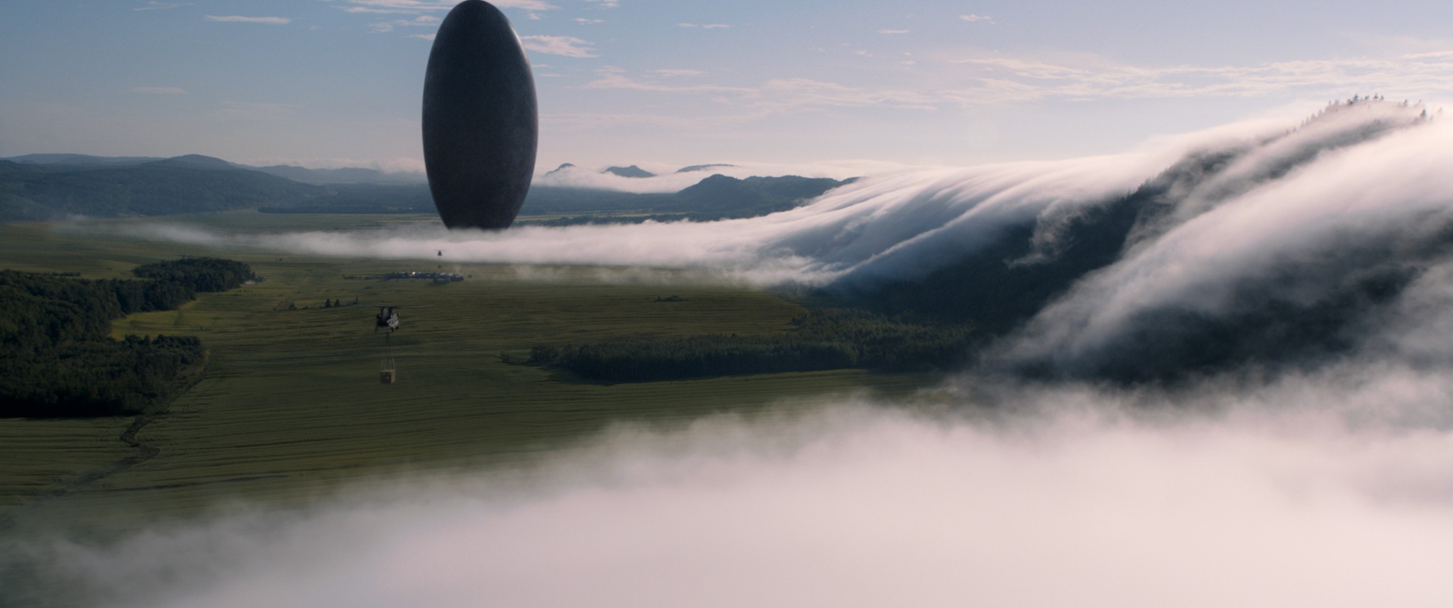 Arrival movie spaceship over a misty landscape HD Wallpaper