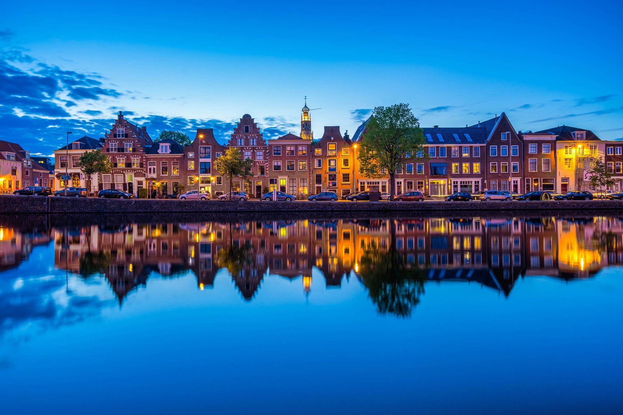 Cityscape of Dutch canal houses at dusk HD Wallpaper