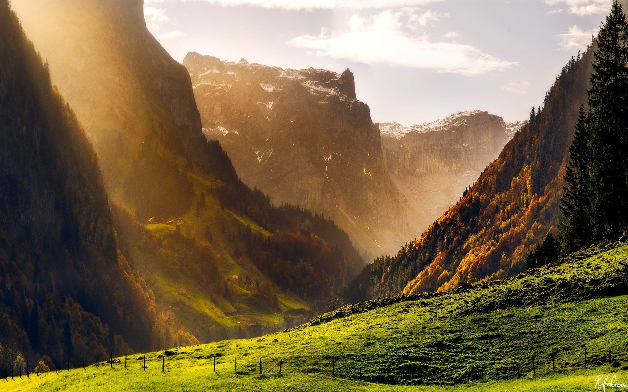 Mountain valley with sunbeams in the Alps HD Wallpaper