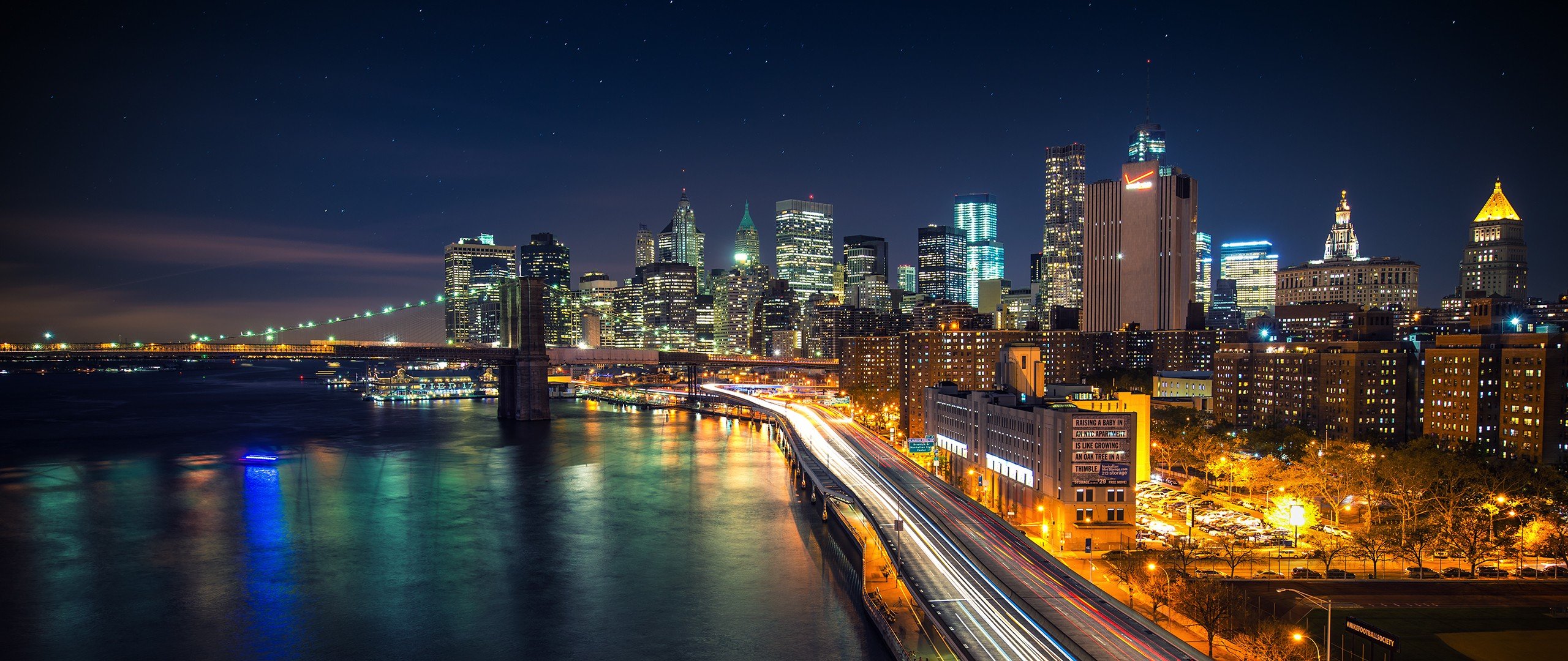 New York City skyline and Brooklyn Bridge at night HD Wallpaper
