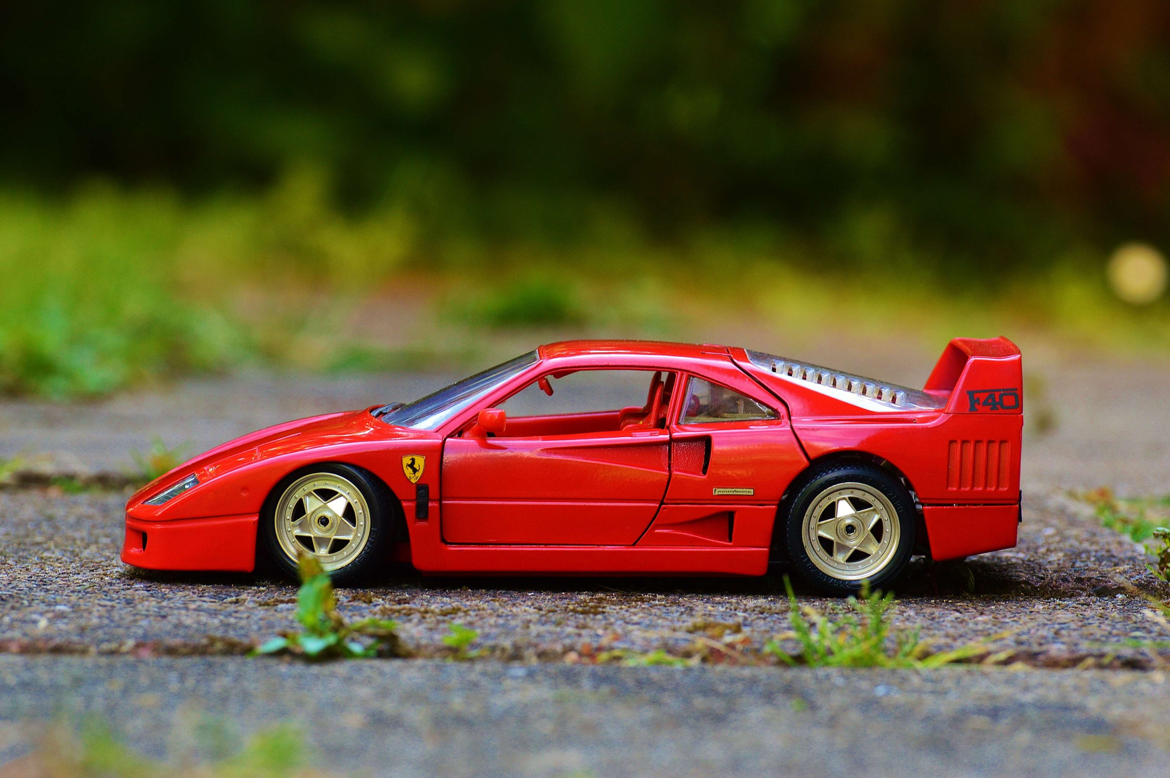 Red Ferrari F40 Toy Car 4K HD Wallpaper