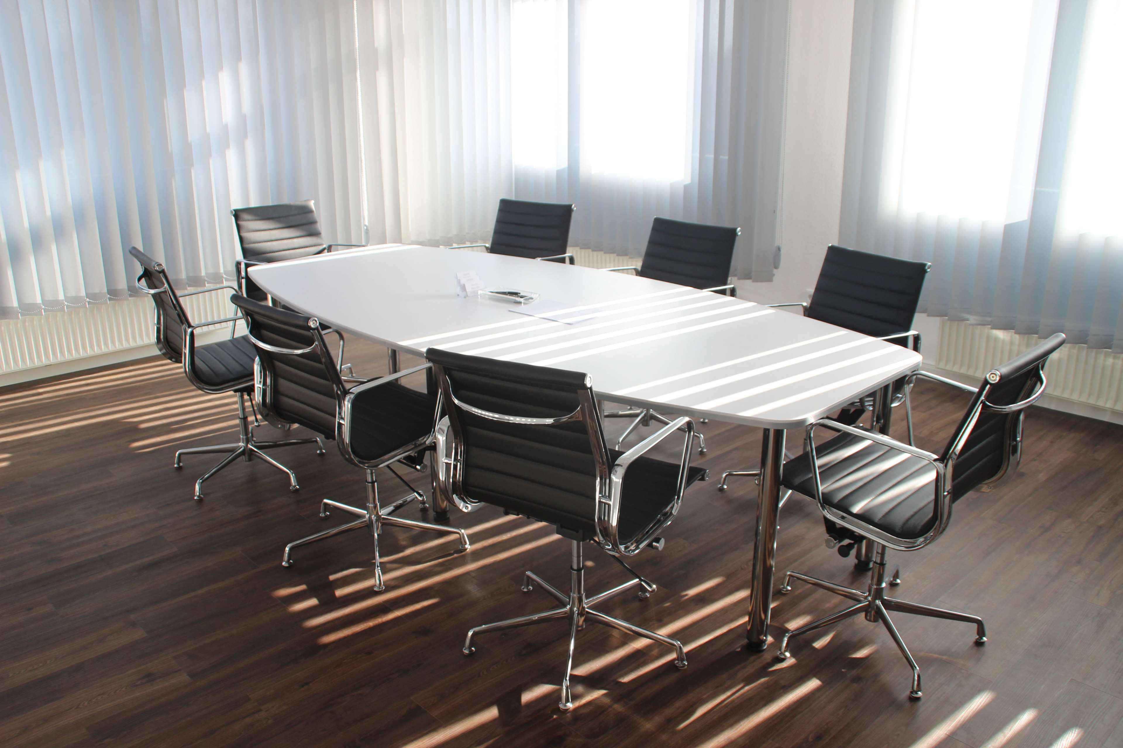 Modern office meeting room with table and chairs HD Wallpaper