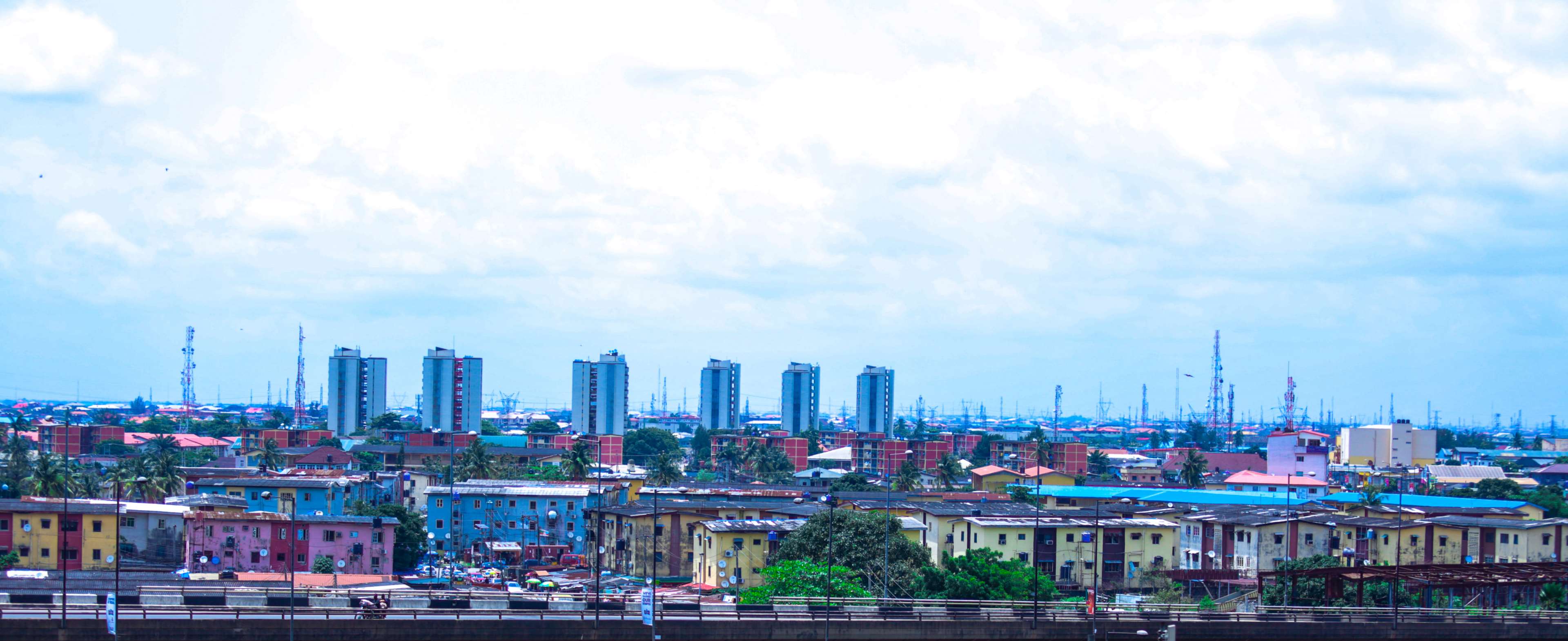 Cityscape with apartment buildings and skyscrapers HD Wallpaper