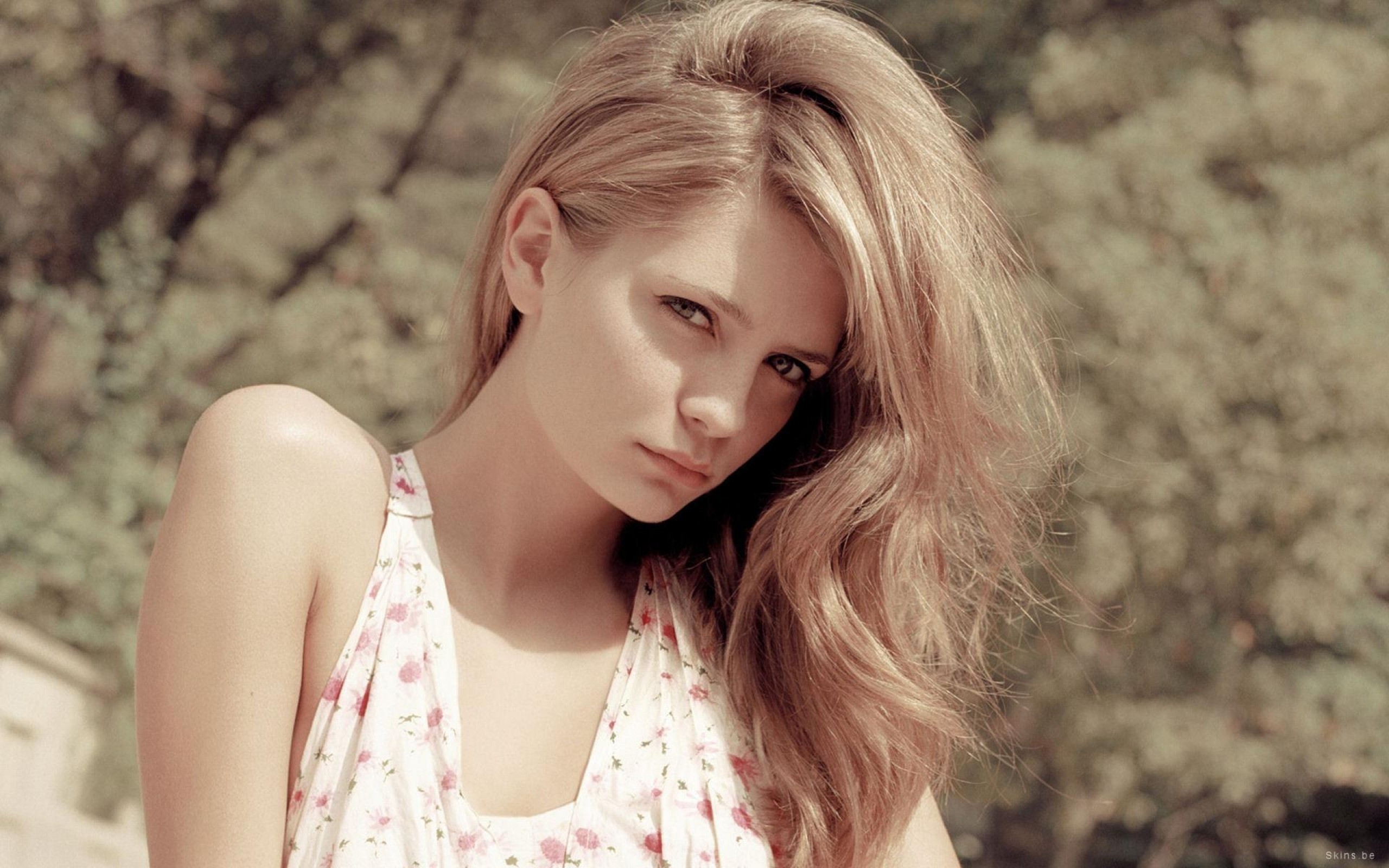 Portrait of a Young Woman with Long Hair Outdoors HD Wallpaper