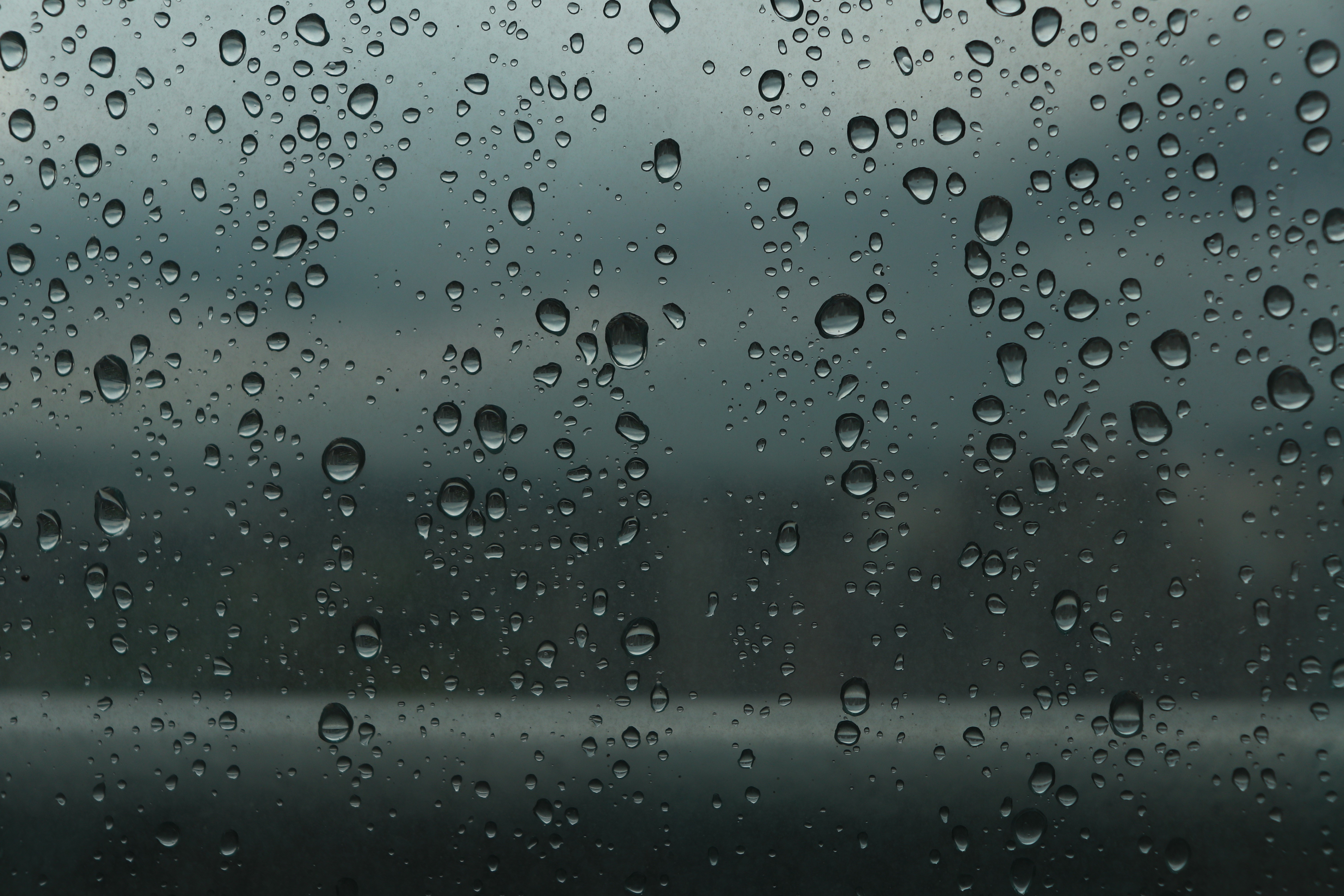 Raindrops on a window HD Wallpaper