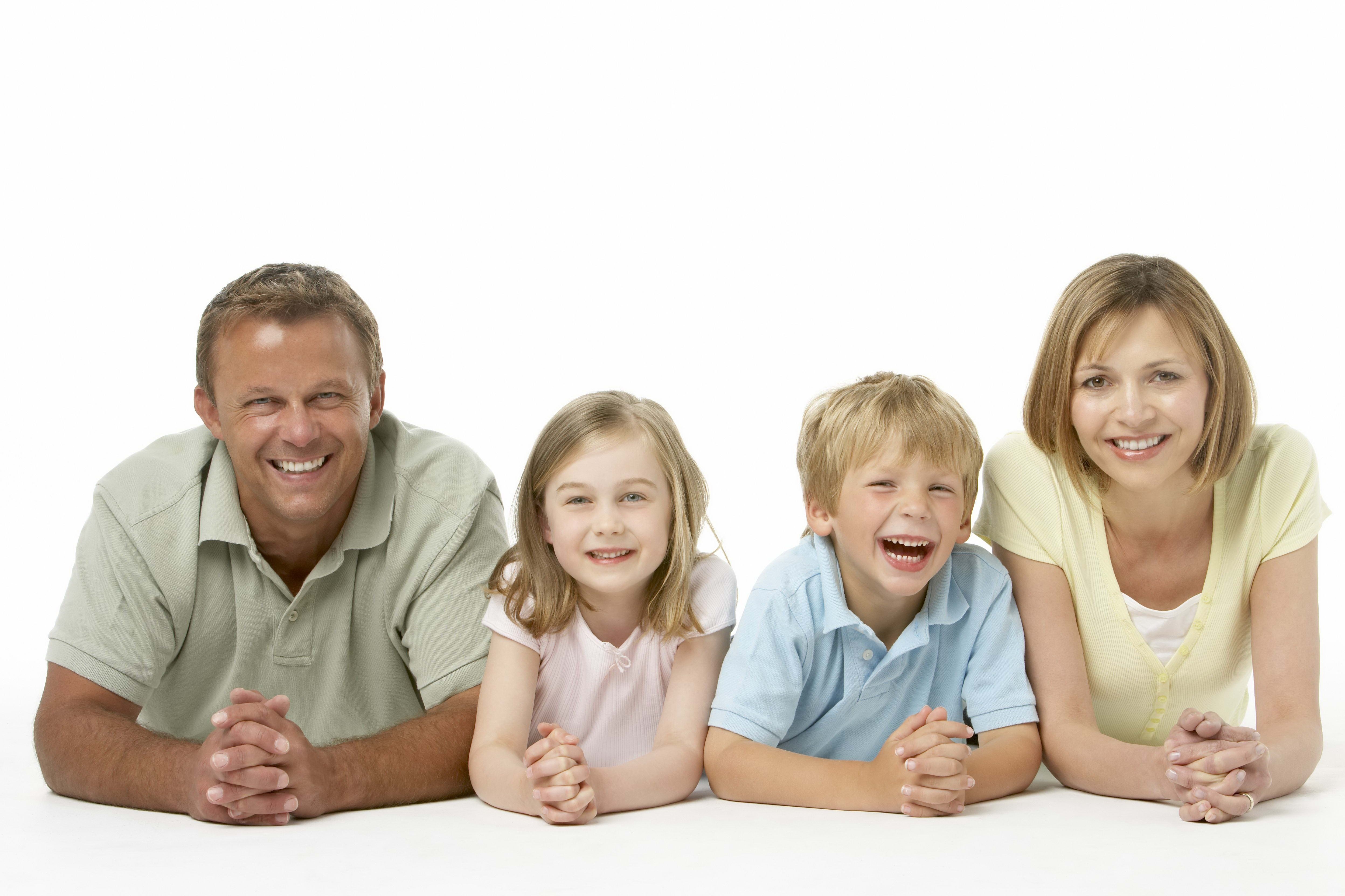 Family of four smiling on a white background HD Wallpaper