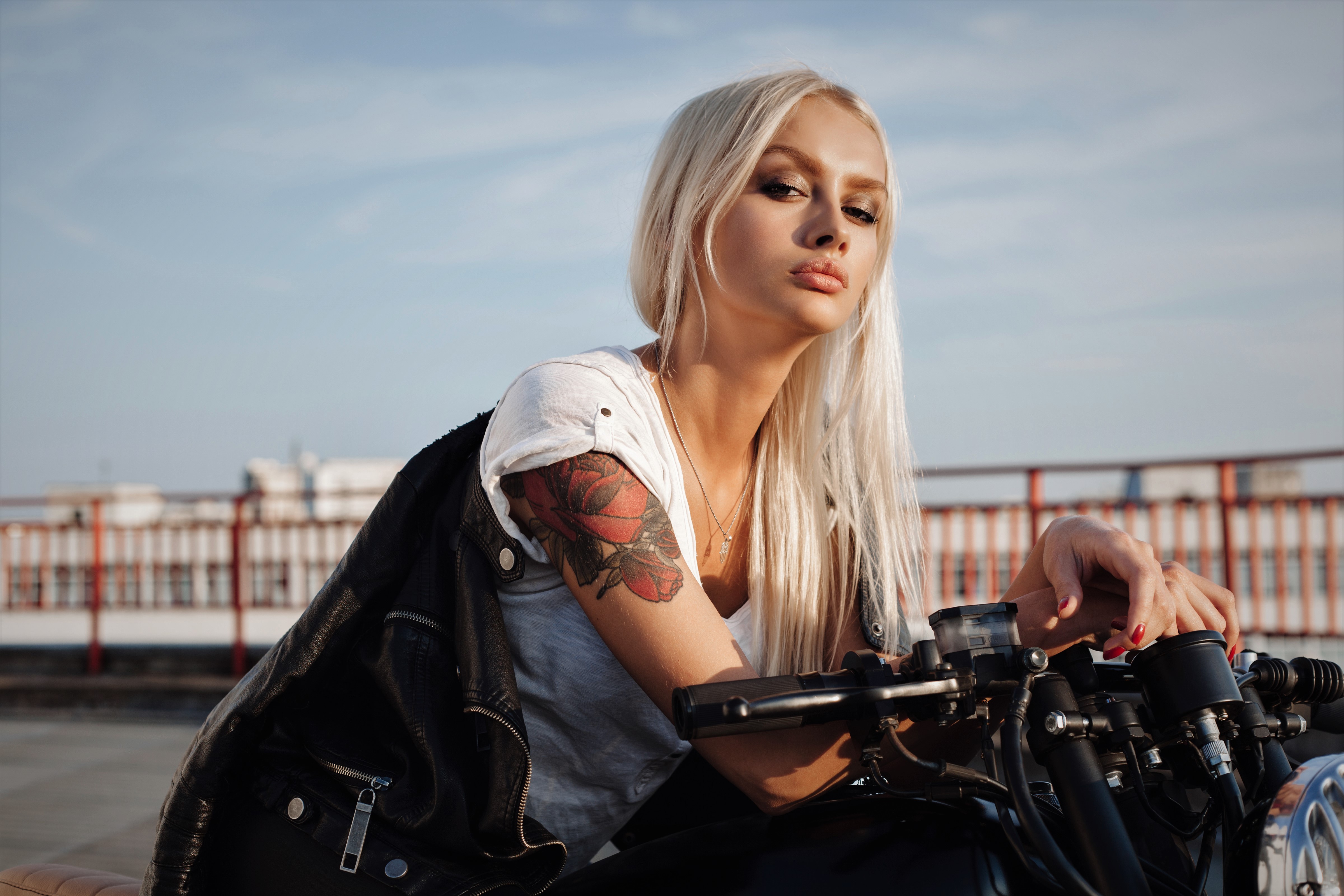 Blonde woman with tattoo on motorcycle HD Wallpaper