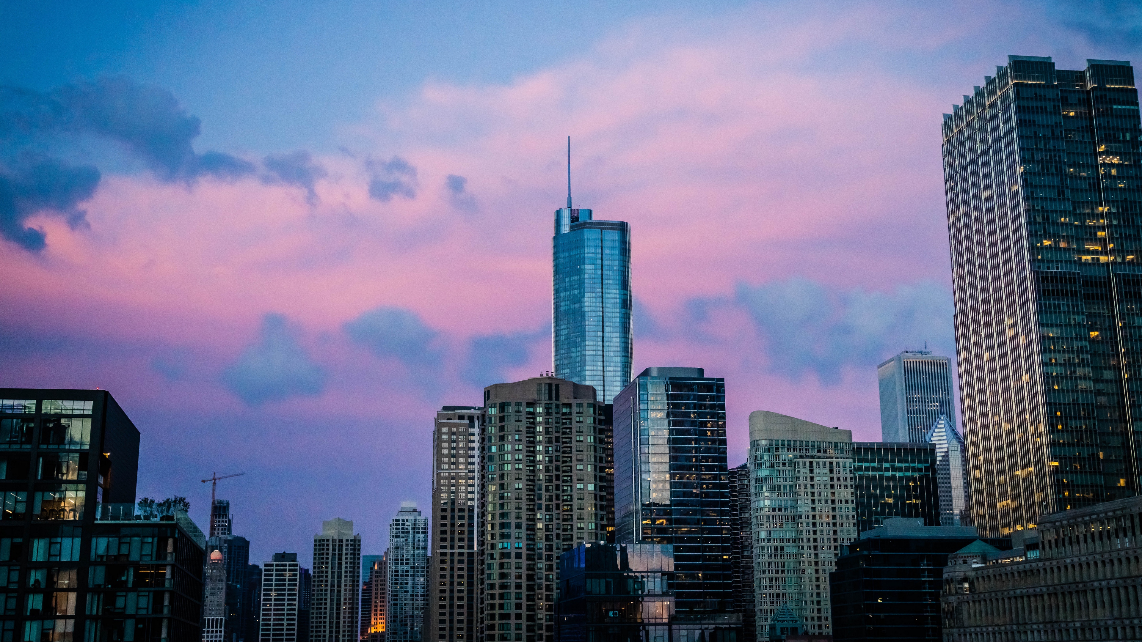 City skyline with skyscrapers at sunset HD Wallpaper