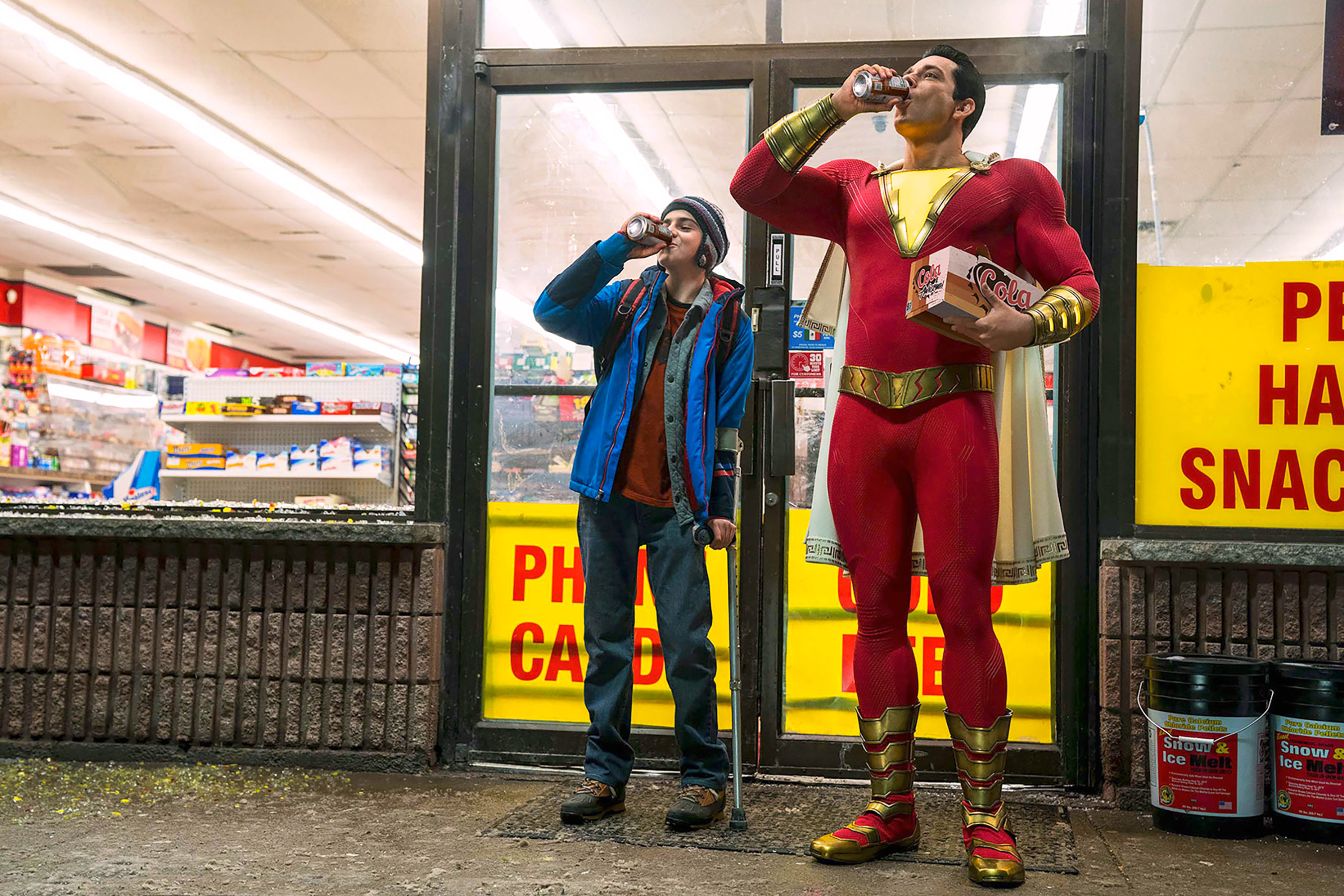 Shazam and Billy Batson drinking soda outside a store HD Wallpaper