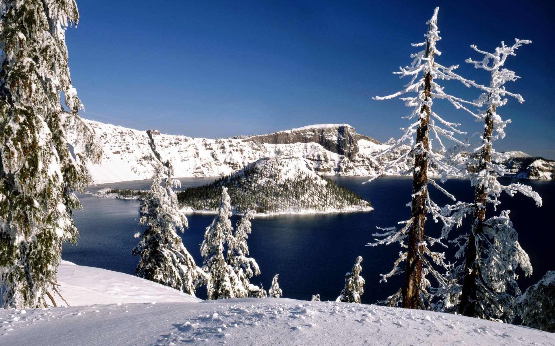 Snow-covered Crater Lake with Wizard Island HD Wallpaper
