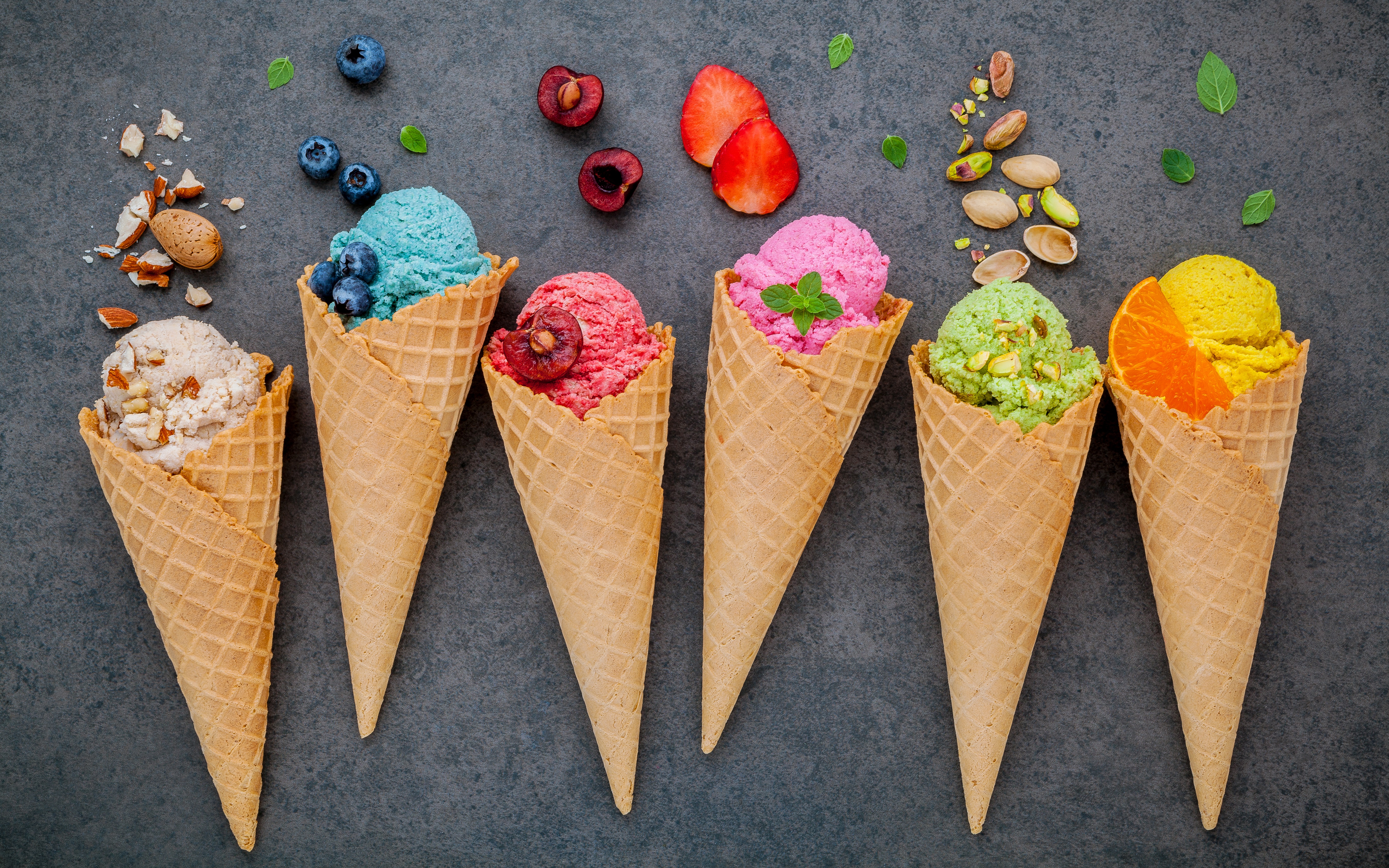 Colorful Ice Cream in Waffle Cones with Fruits and Nuts HD Wallpaper