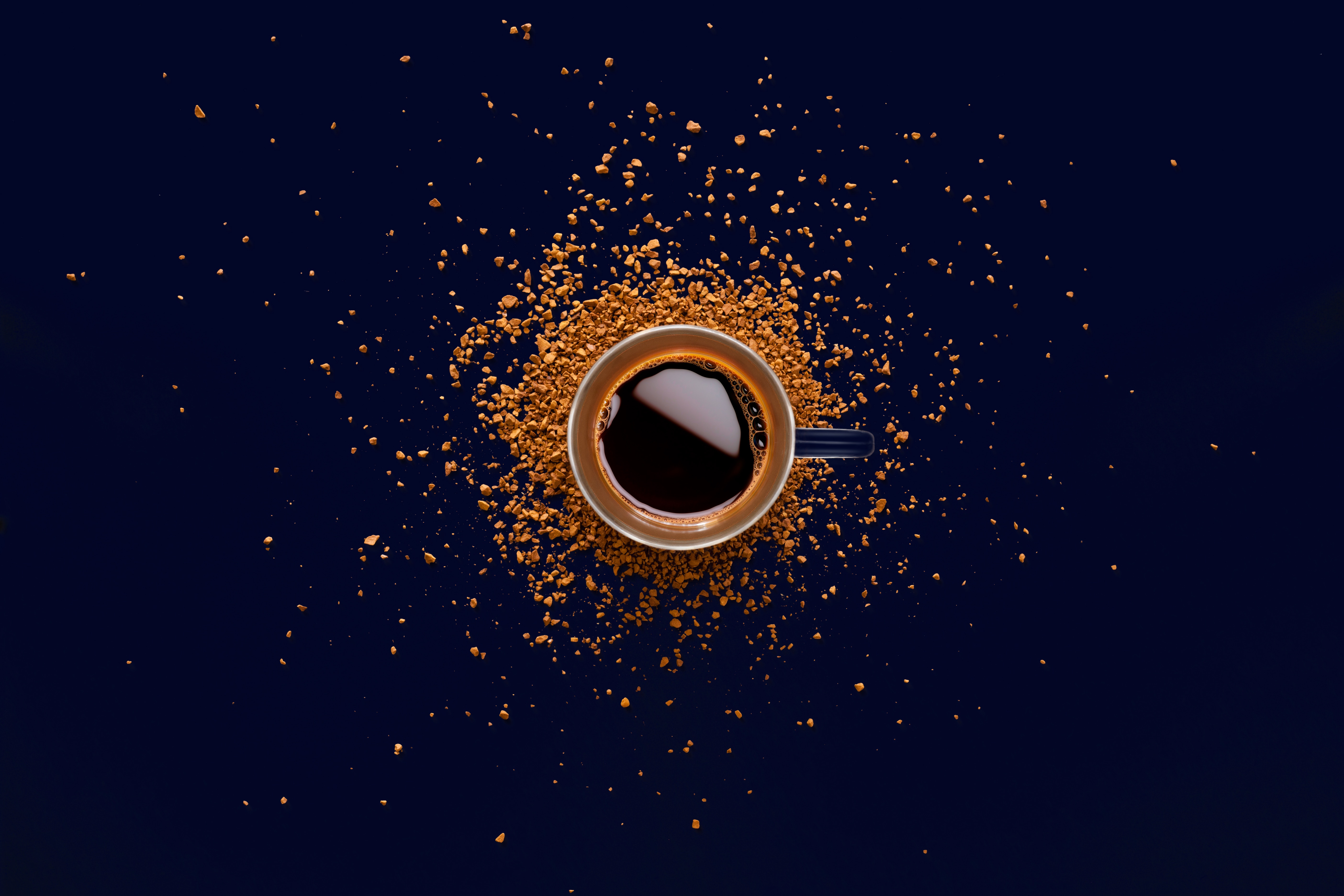 Cup of coffee with instant coffee grains HD Wallpaper
