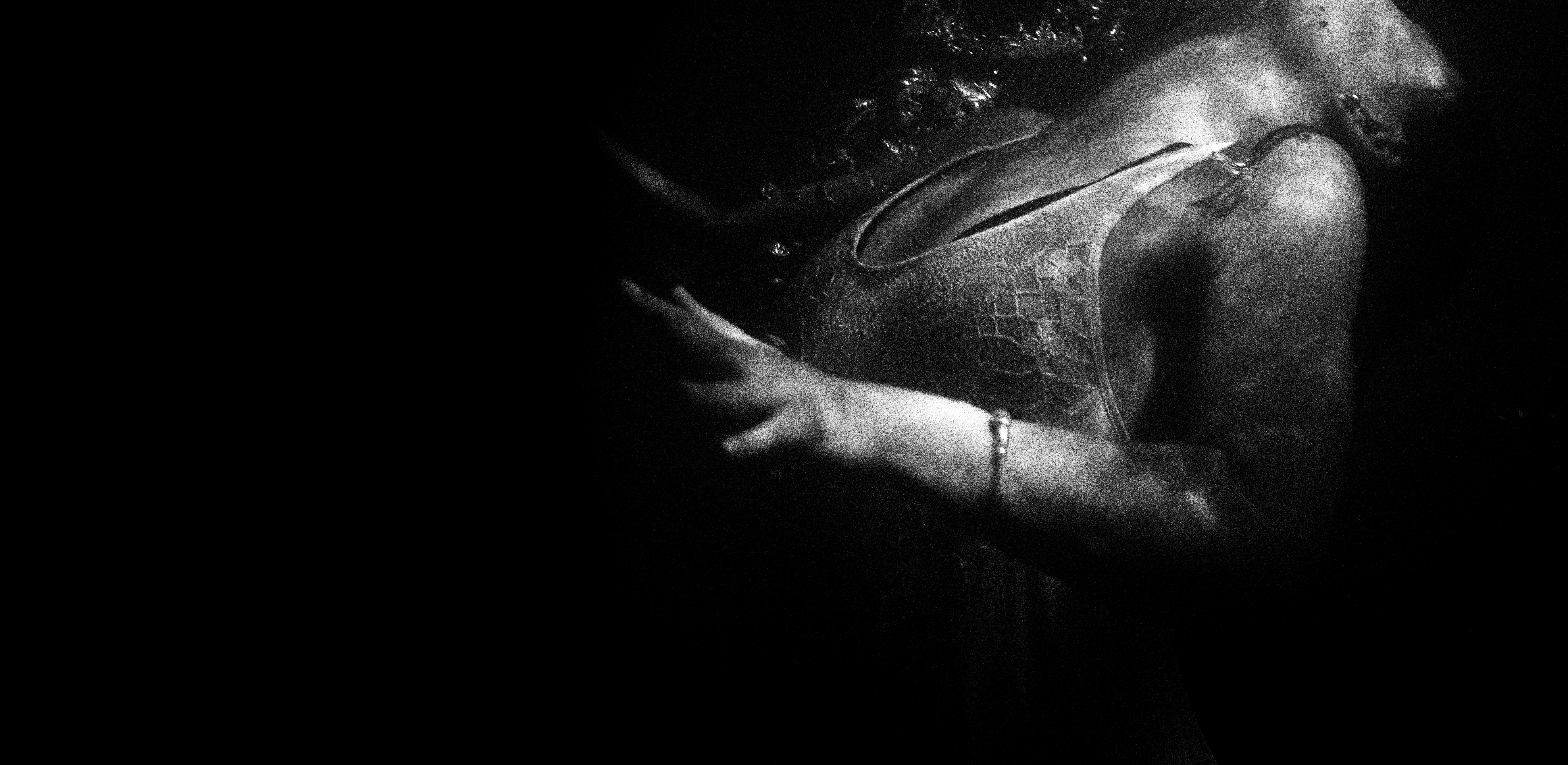 Woman underwater in a lacey top HD Wallpaper