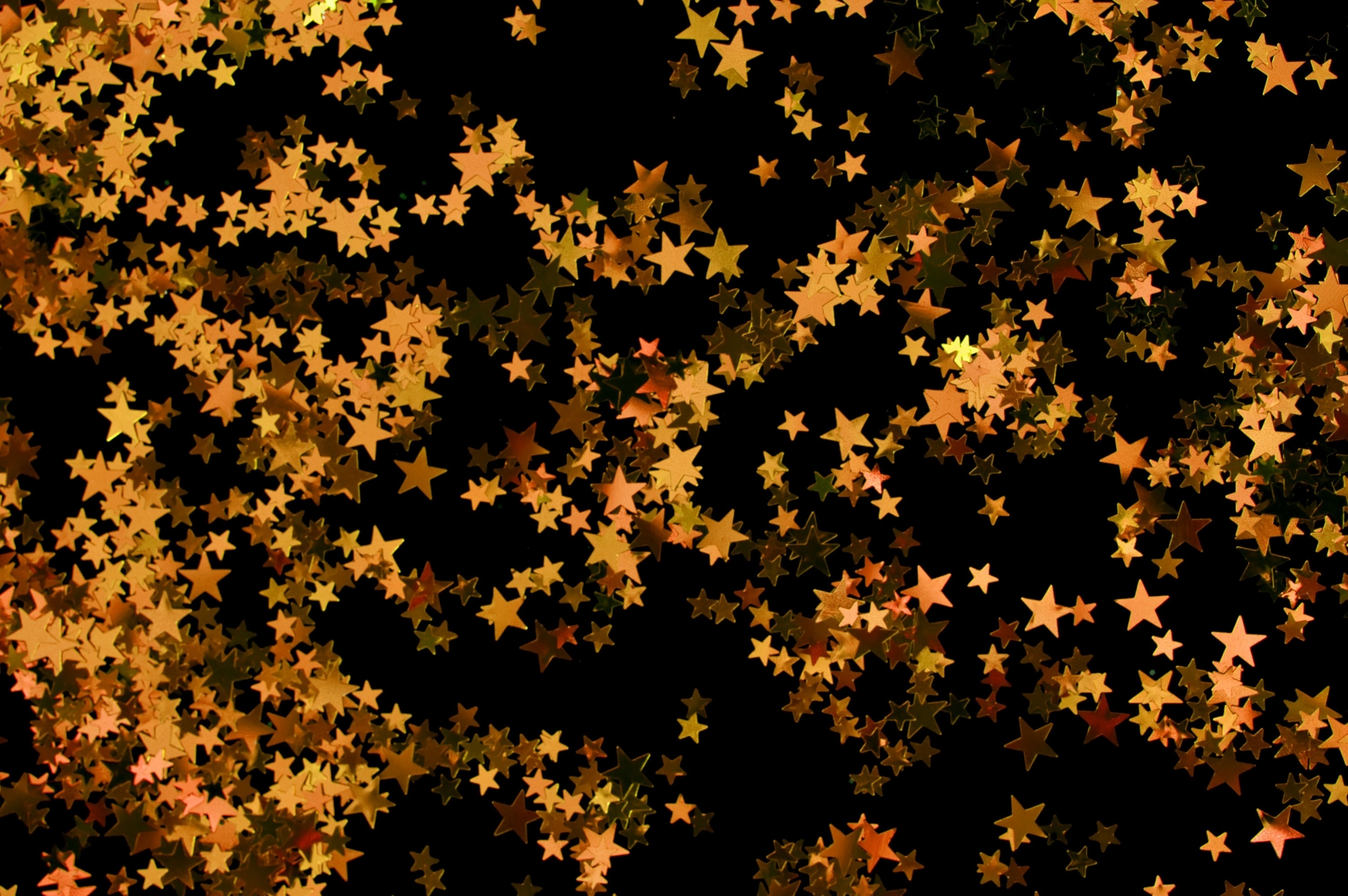 Golden stars on black background HD Wallpaper