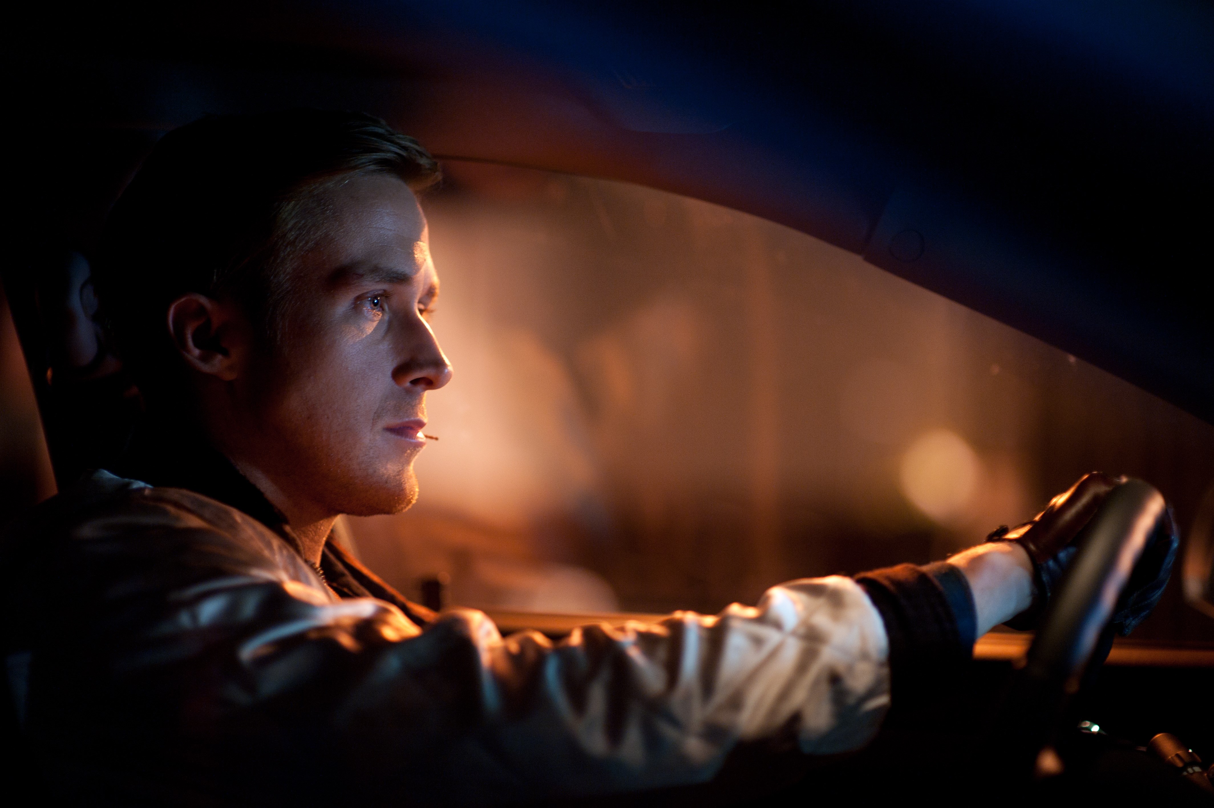 Ryan Gosling driving a car at night HD Wallpaper