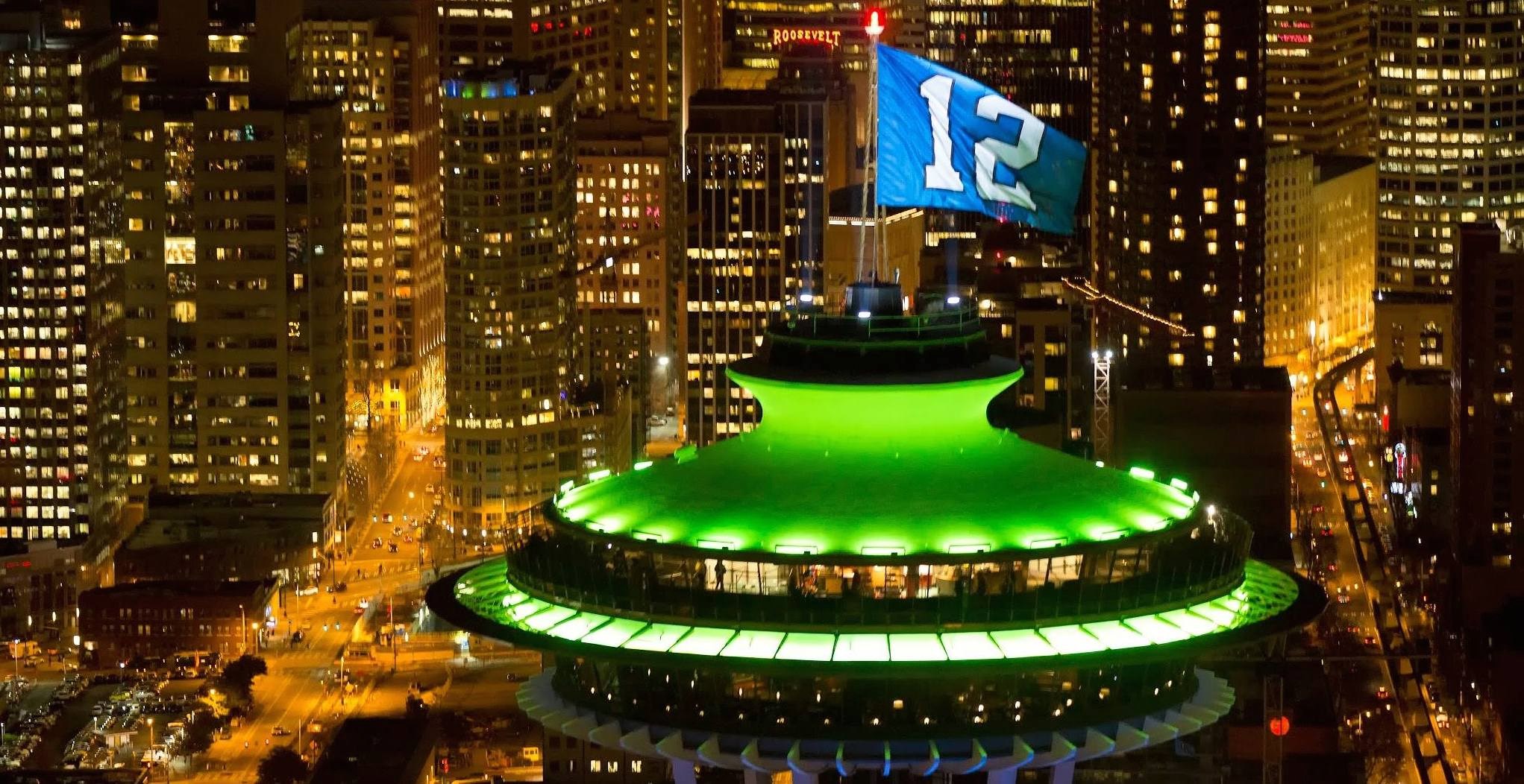 Seattle skyline with Space Needle and 12th Man flag HD Wallpaper